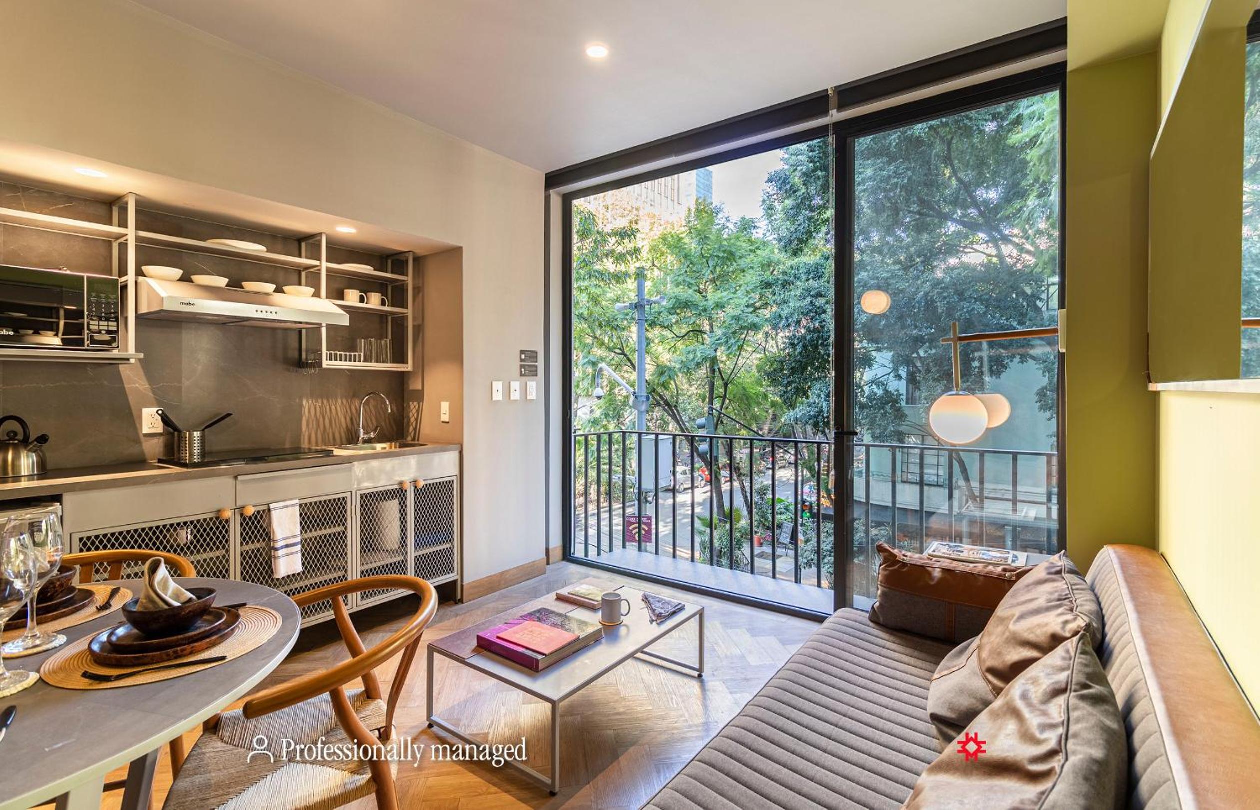 One-Bedroom Apartment with Balcony and City View - Photo 1