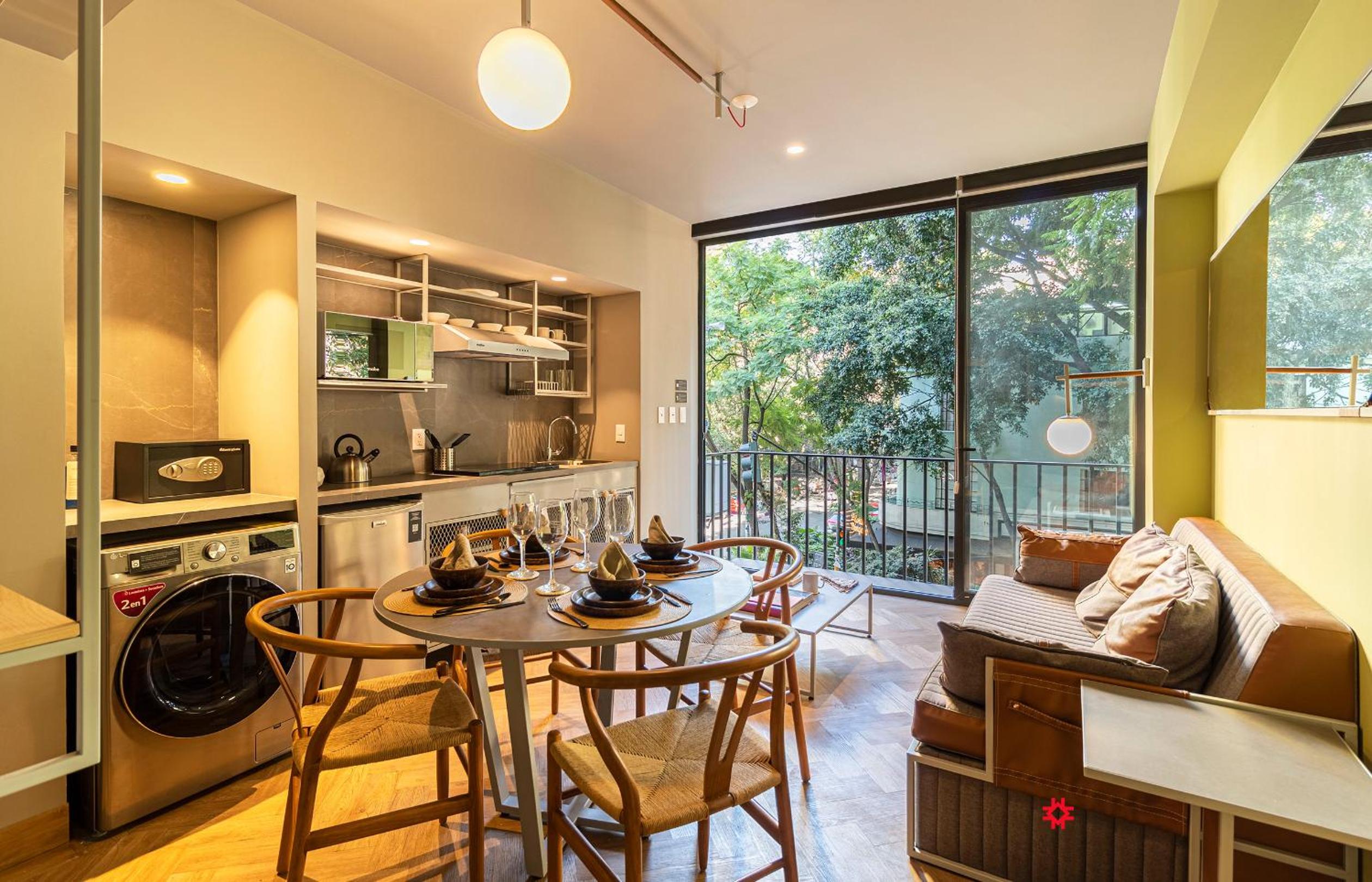 One-Bedroom Apartment with Balcony and City View - Photo 15