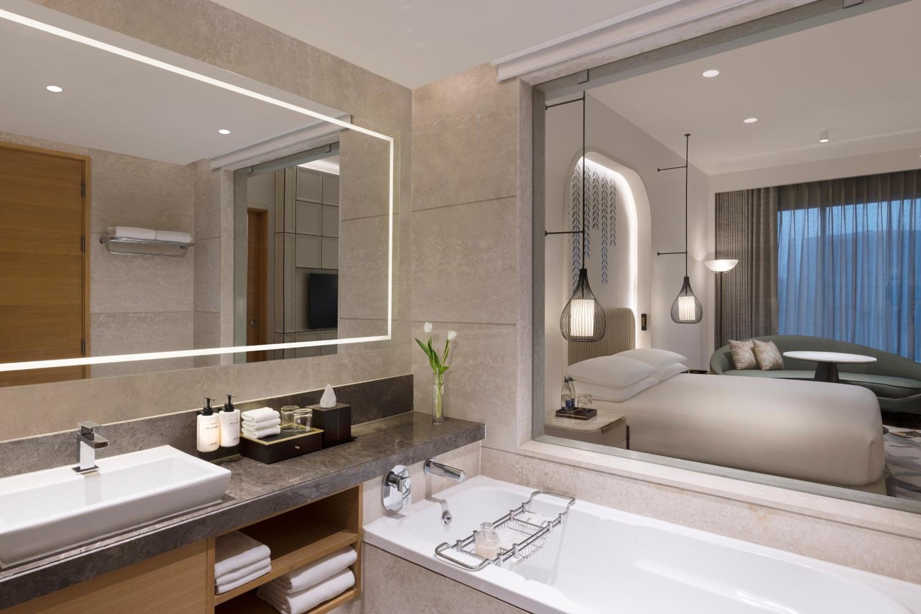 One-Bedroom Suite: 20% off on food,soft beverages, laundry & local transportation(upto 10 km); enjoy 90-min spa at 60mins spa price; BOGO offer on select beverages(5–8 pm) at Connexions Bar;3-course meal at House of Han-T&C apply photo 2