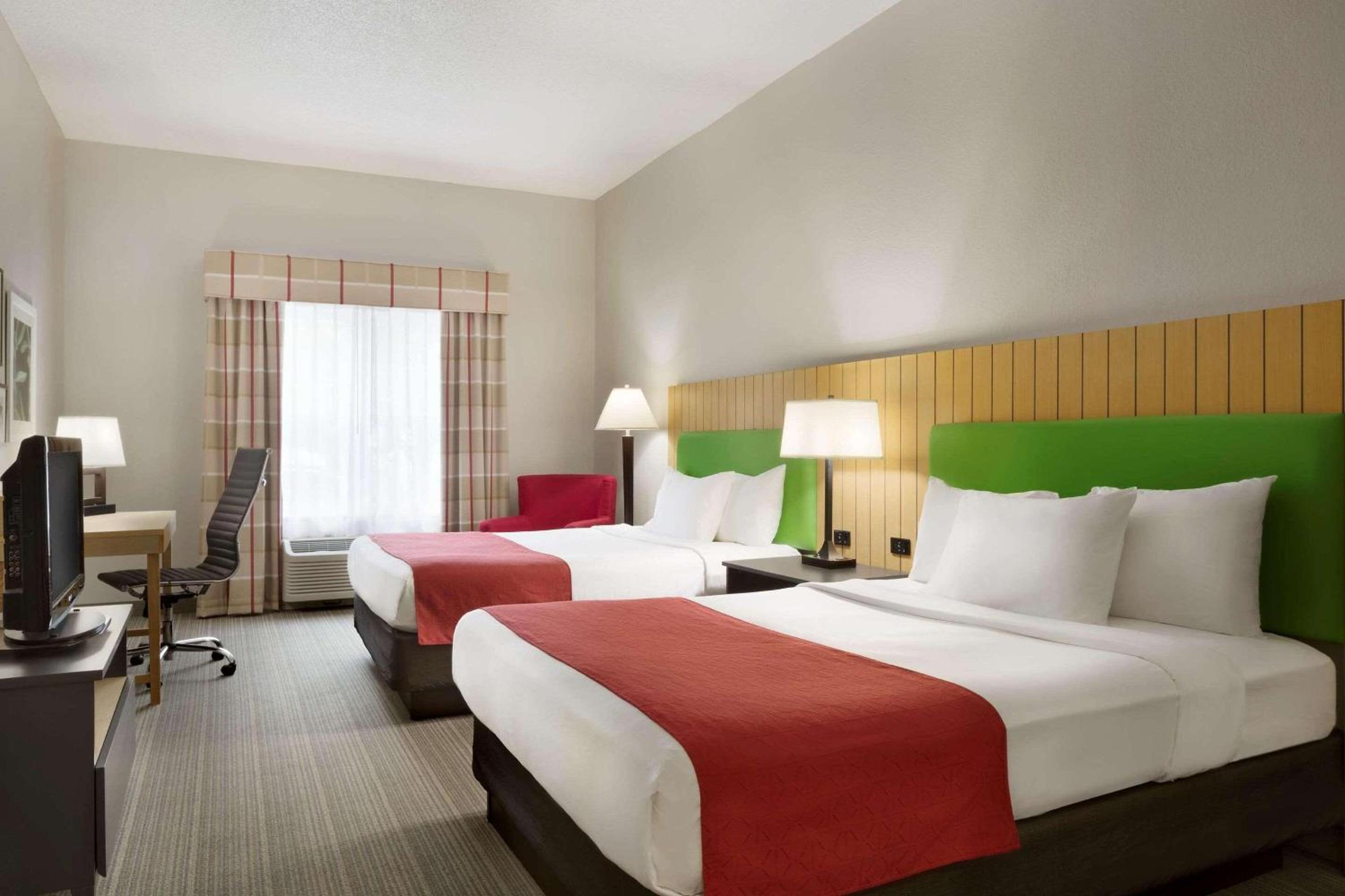 Queen Room with Two Queen Beds - Photo 1