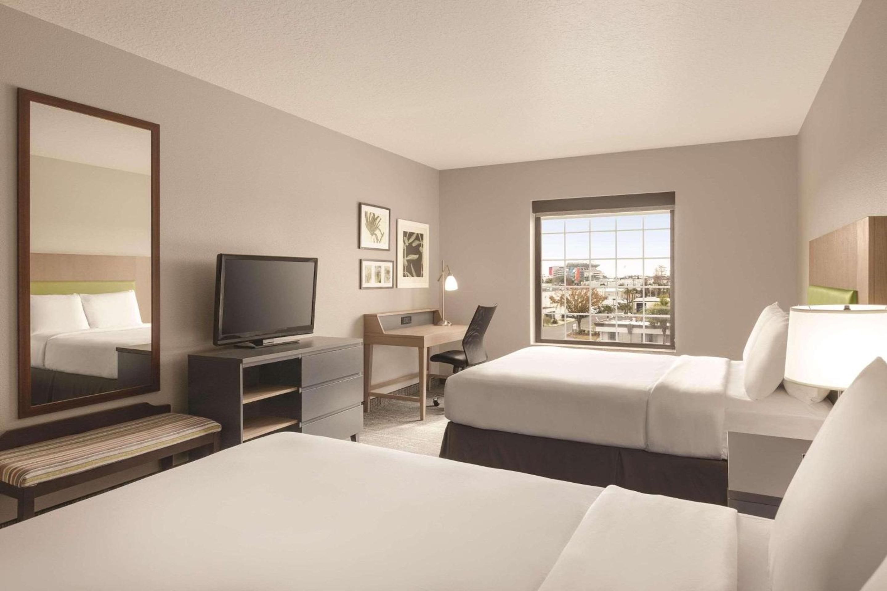 Premium Queen Room with Two Queen Beds - Non-Smoking - Photo 1