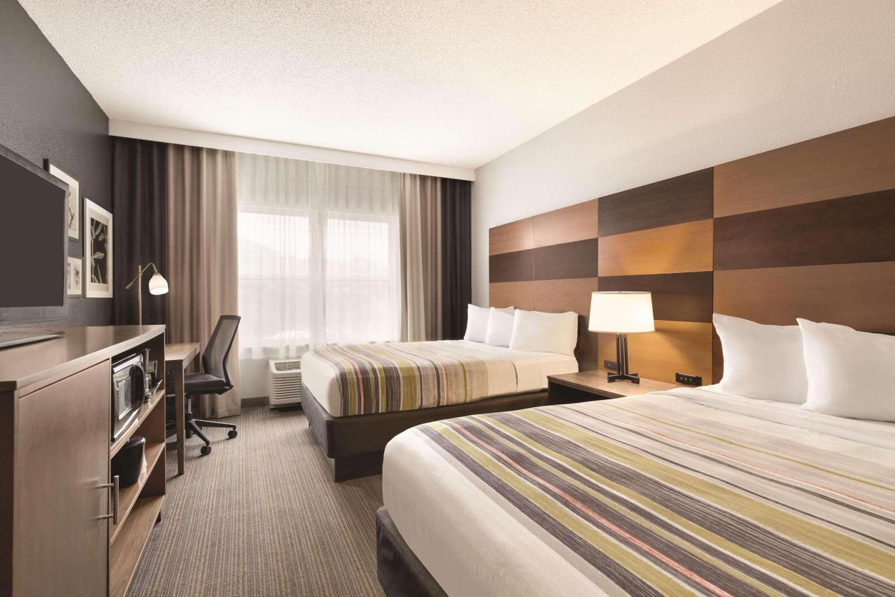 Queen Room with Two Queen Beds - Photo 1