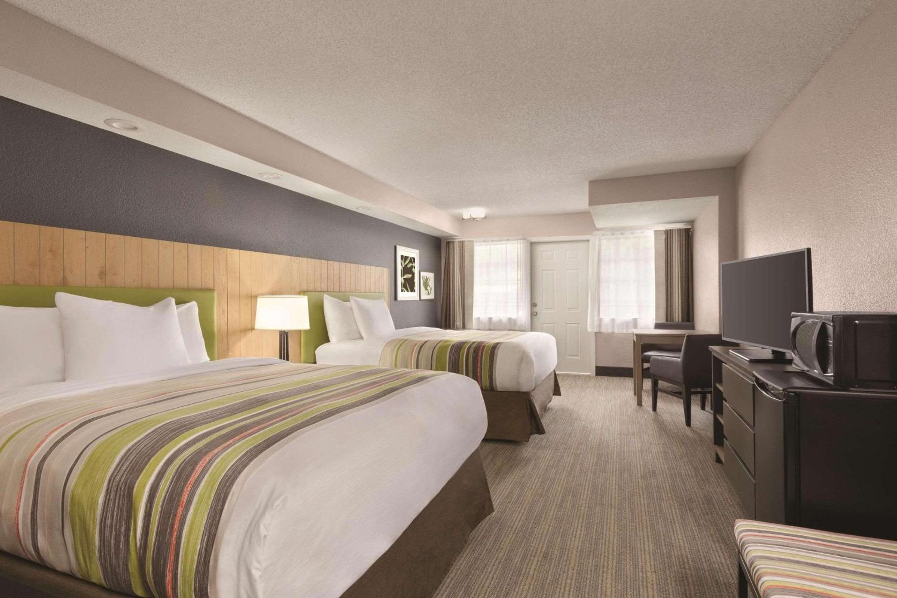 Premium Queen Room with Two Queen Beds and Balcony - Non-Smoking