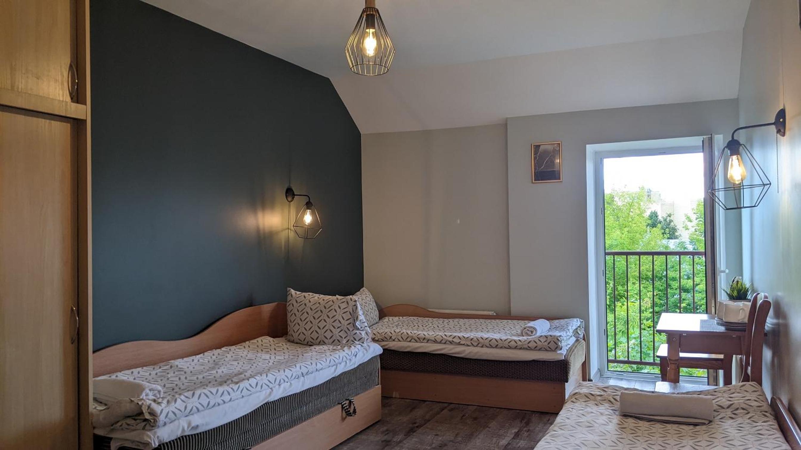 Quadruple Room with Private Bathroom photo 1