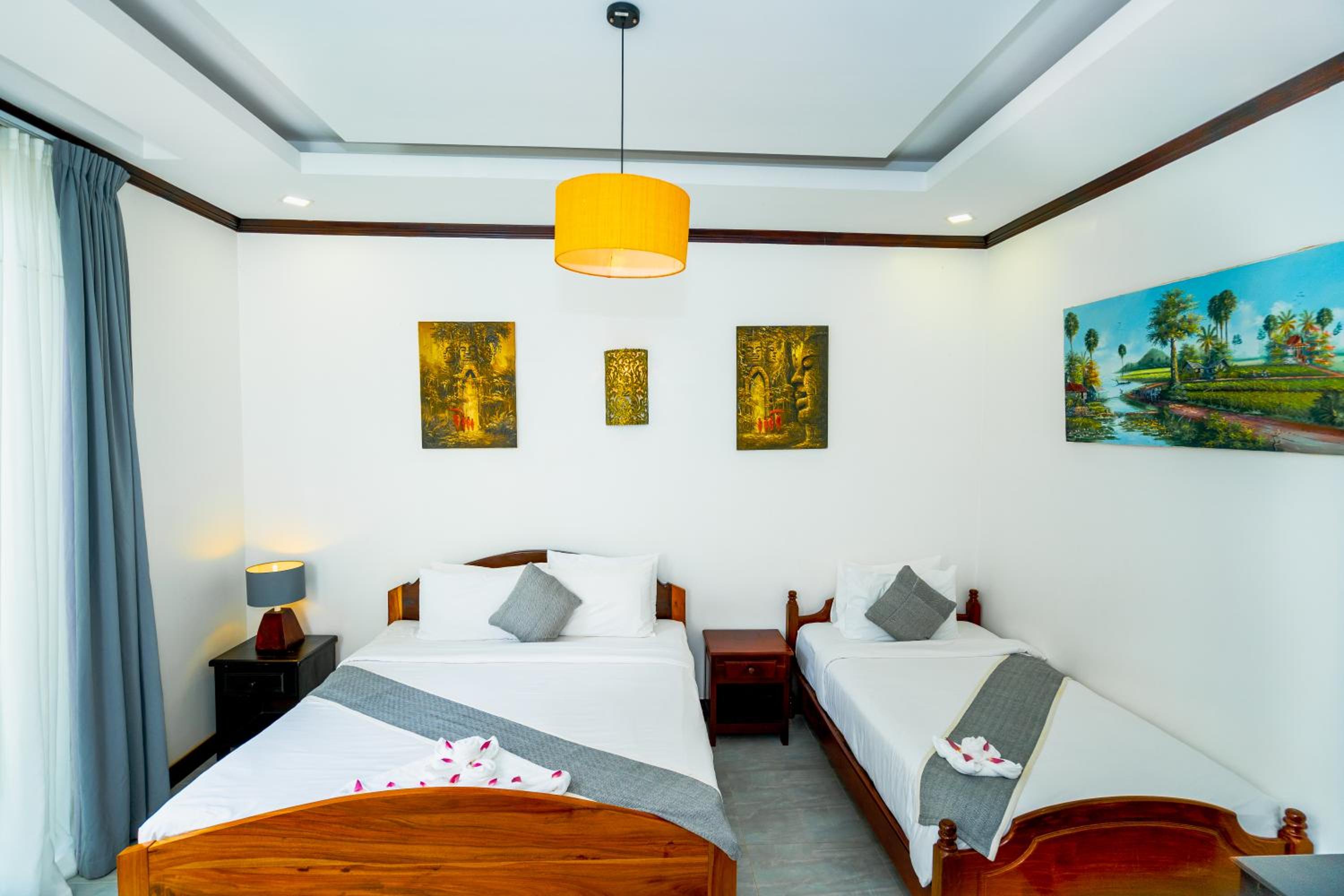 Deluxe Twin Room - Photo 2