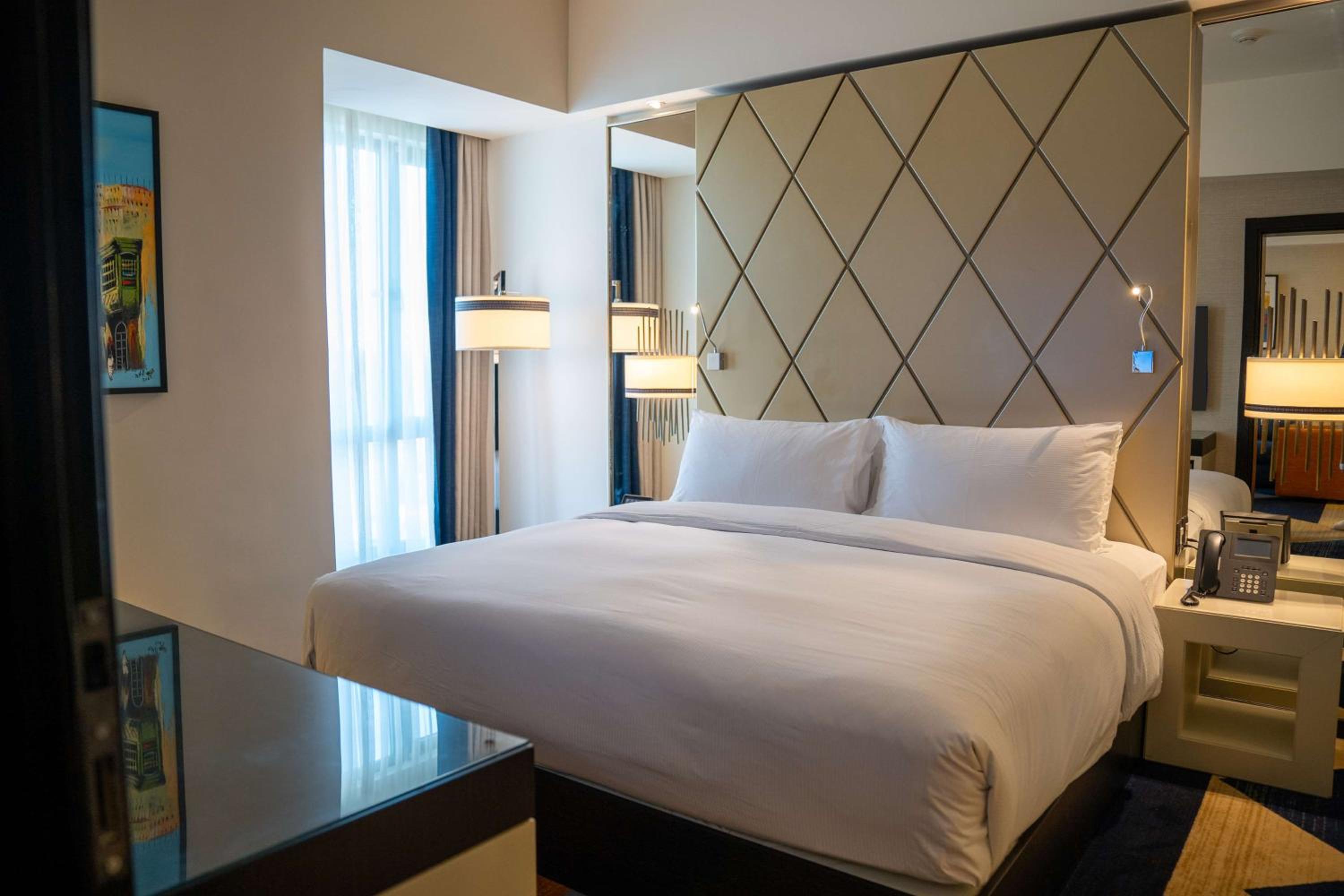 Two-Bedroom Suite with One King and Two Twin Beds