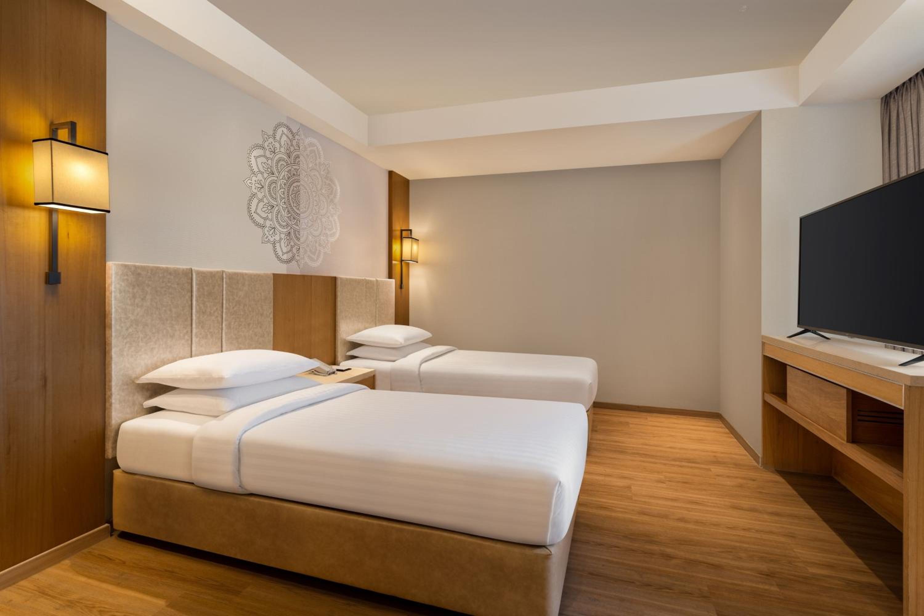 Two-Bedroom Family Suite with City View photo