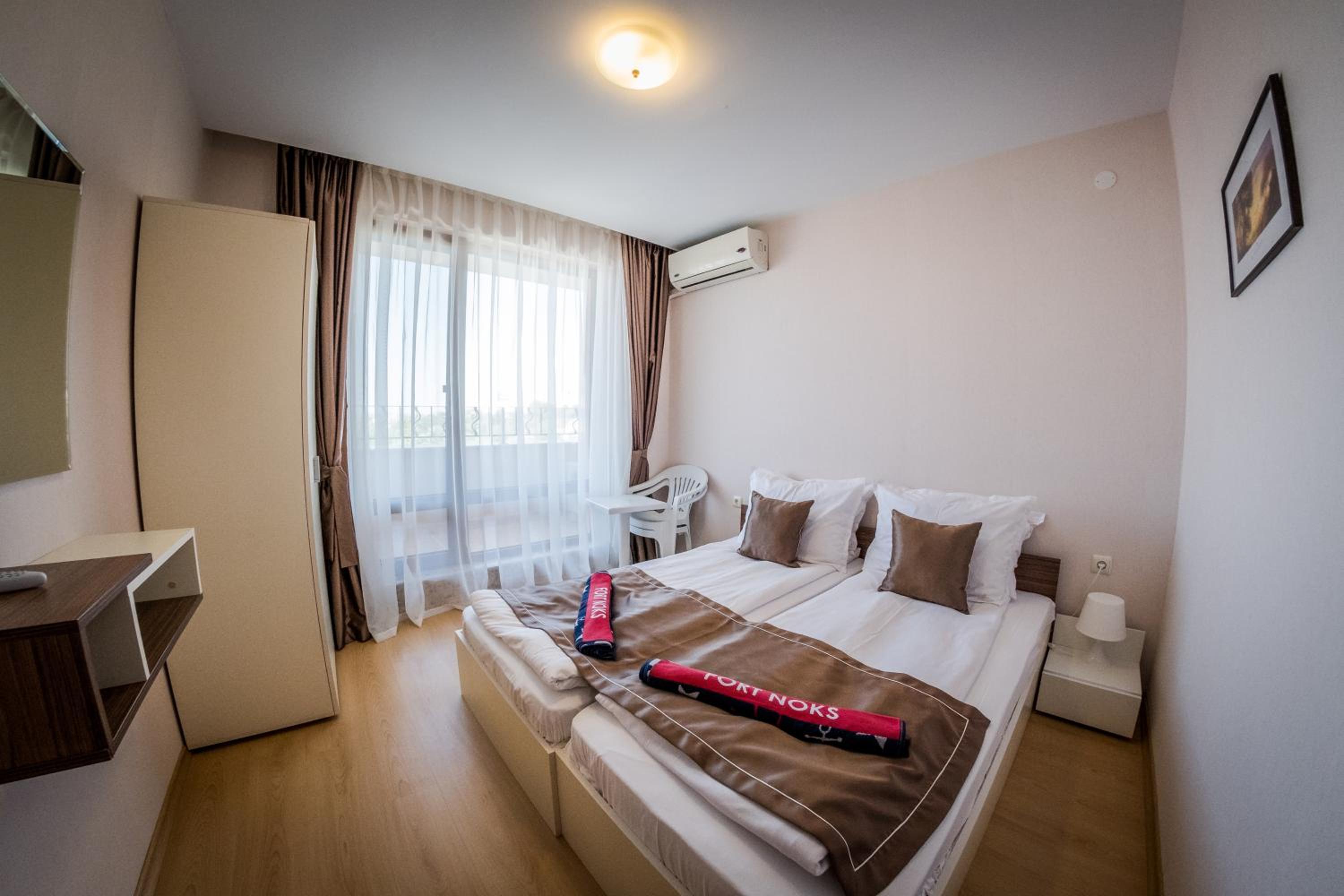 One-Bedroom Apartment with Balcony (2 Adults + 2 Children) photo 1