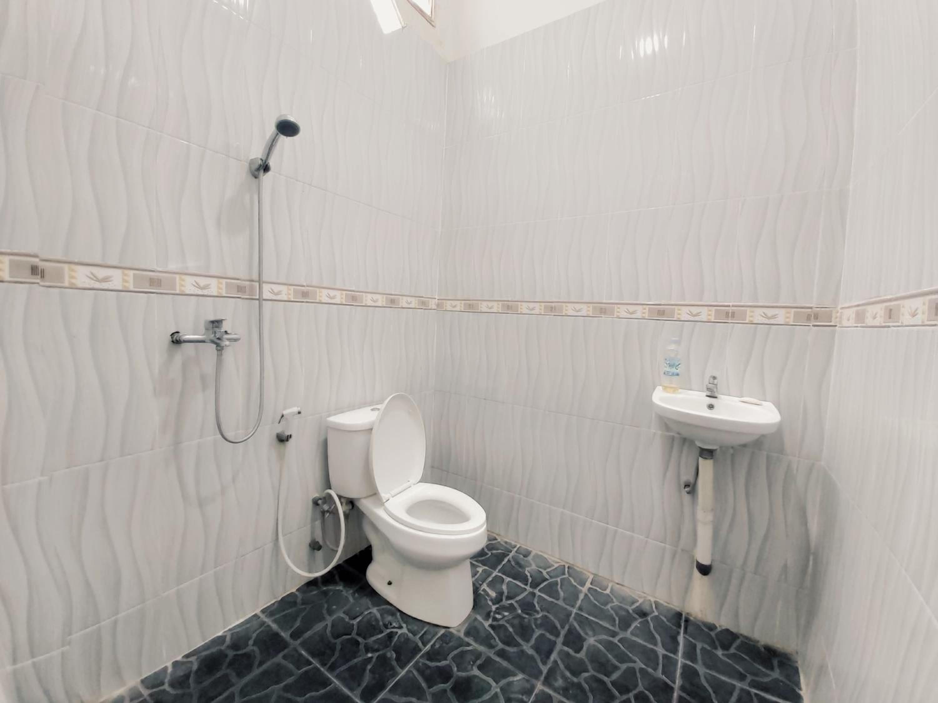 Three-Bedroom House - Photo 12