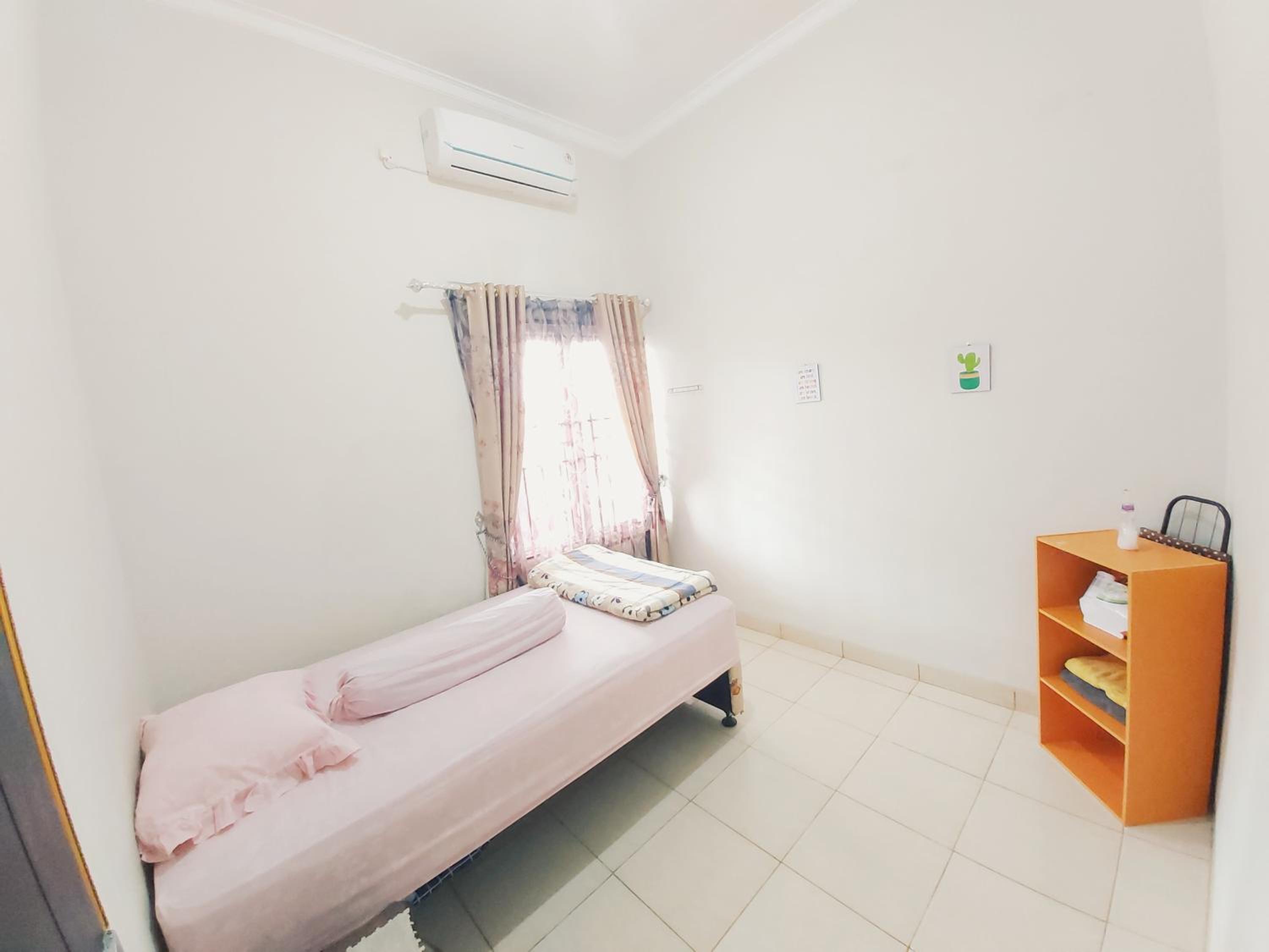 Three-Bedroom House - Photo 1