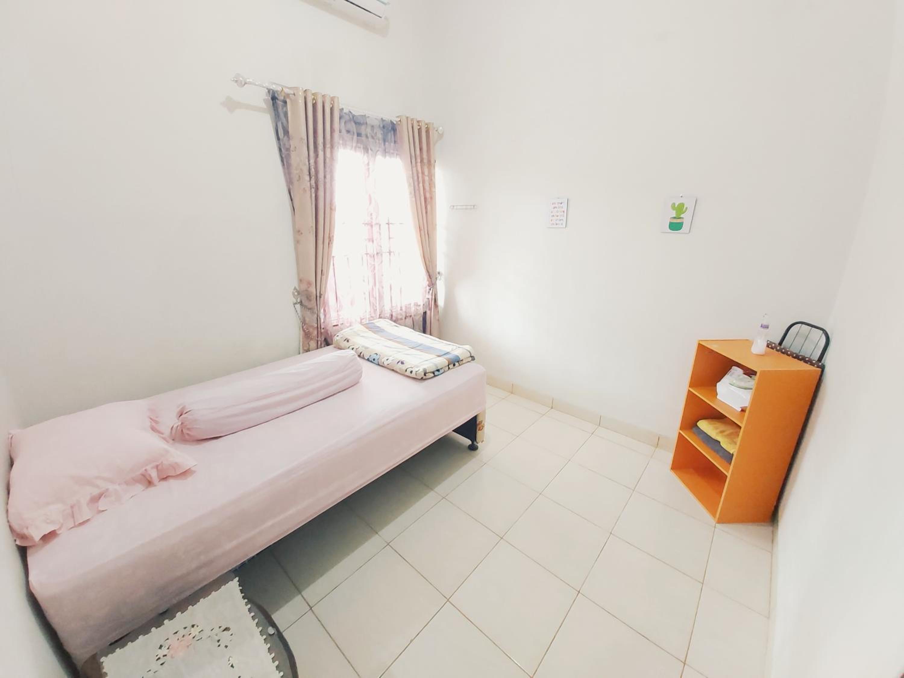 Three-Bedroom House - Photo 11