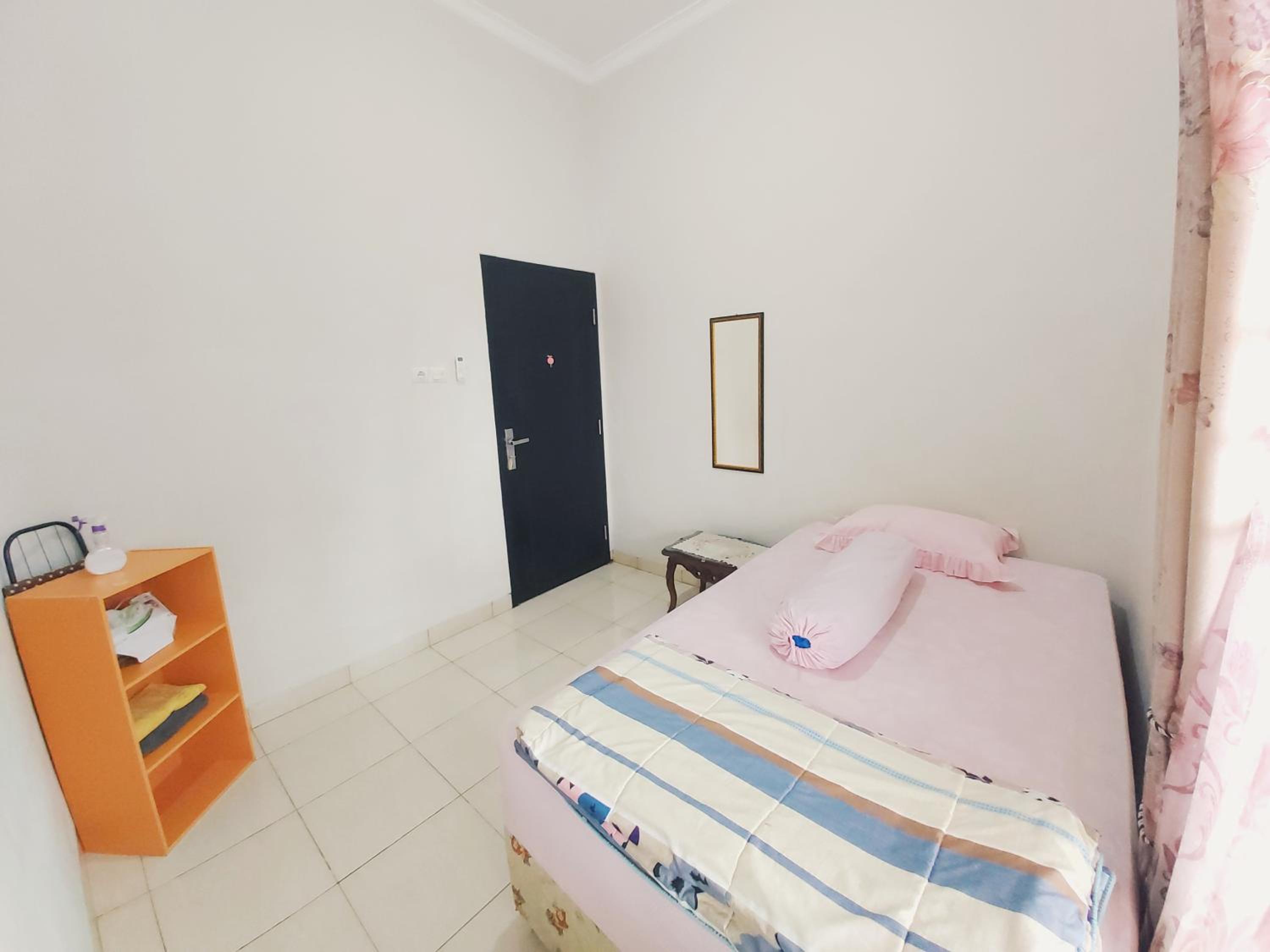 Three-Bedroom House - Photo 10