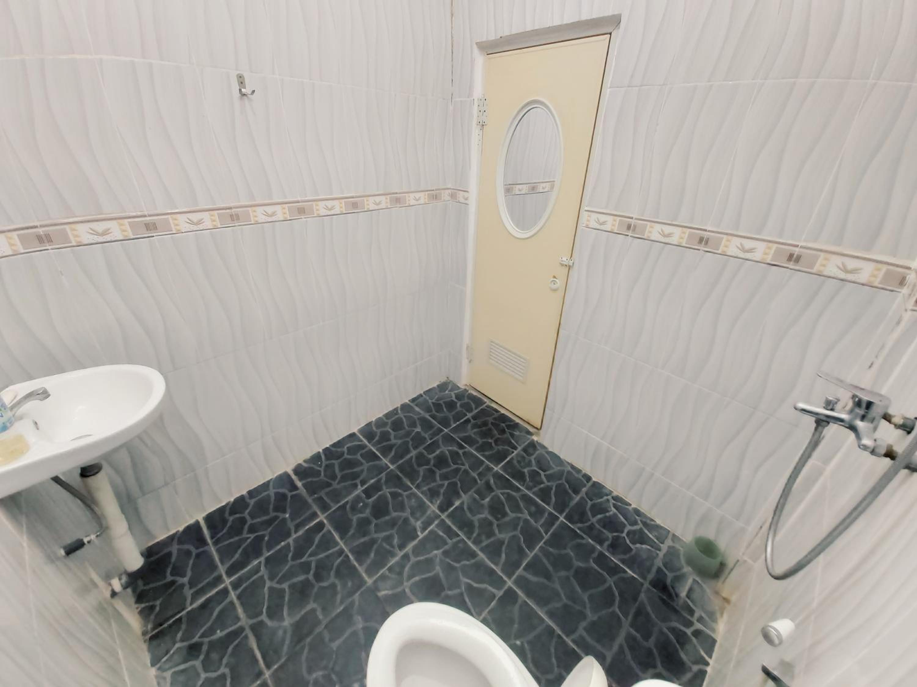 Three-Bedroom House - Photo 7