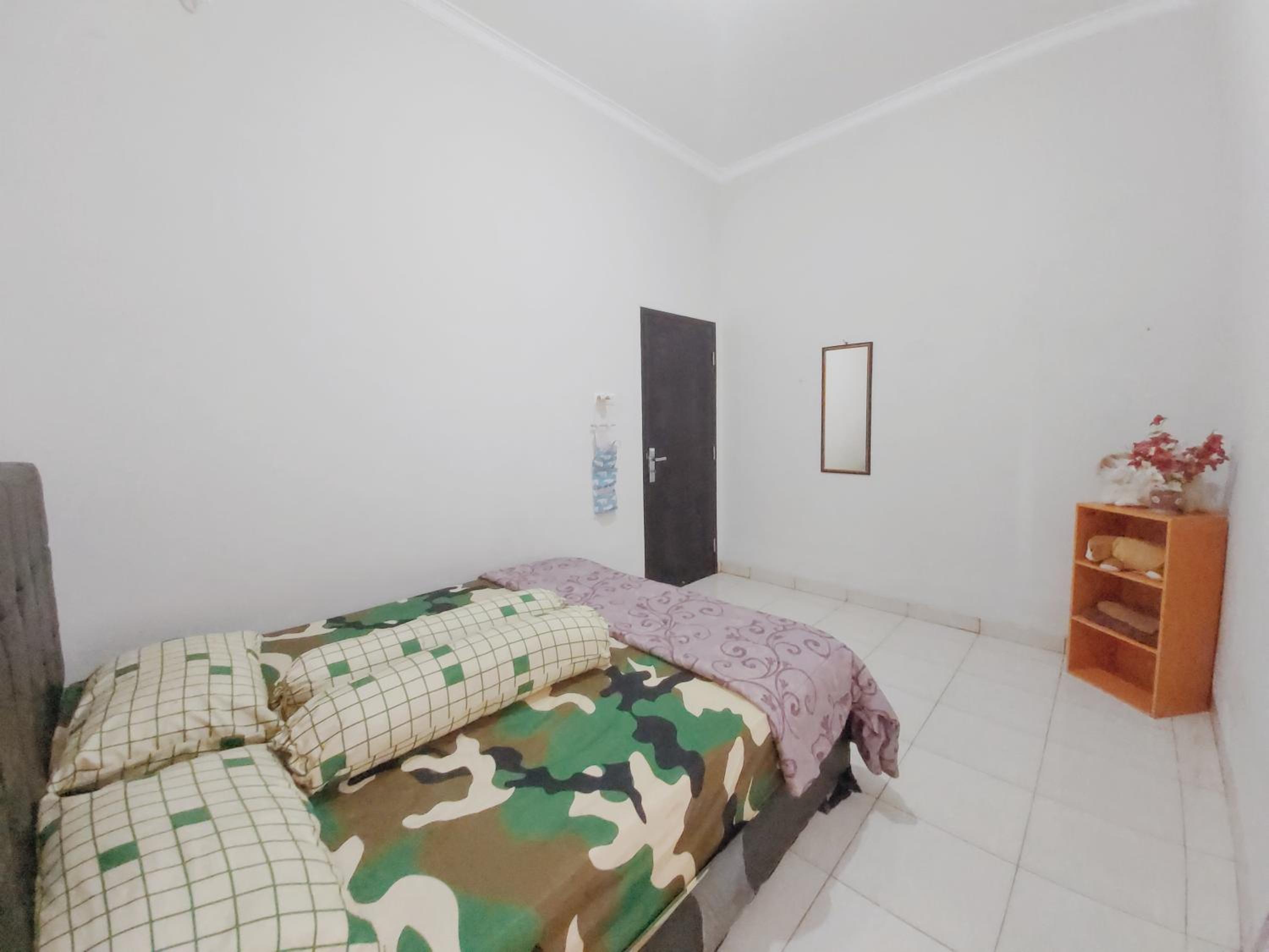 Three-Bedroom House - Photo 15