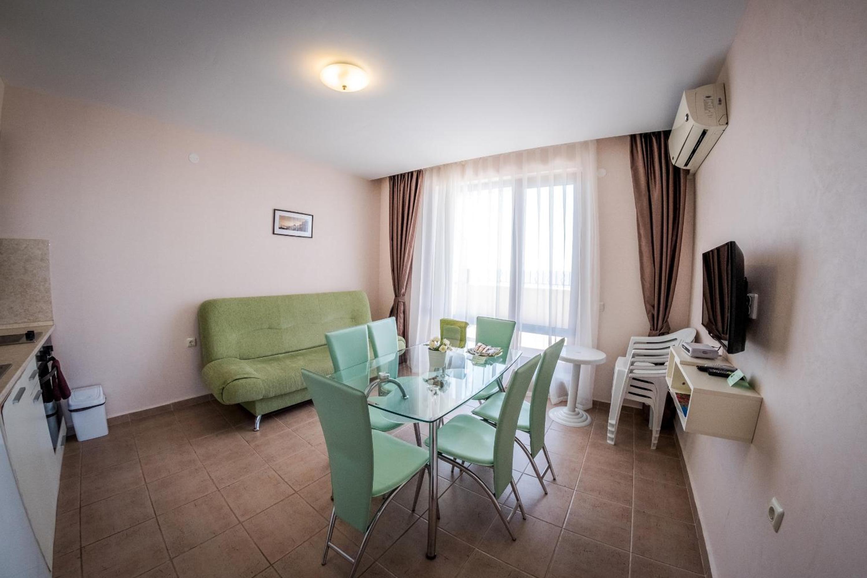 Two-Bedroom Apartment with Balcony and Side Sea View (4 Adults + 2 Children)