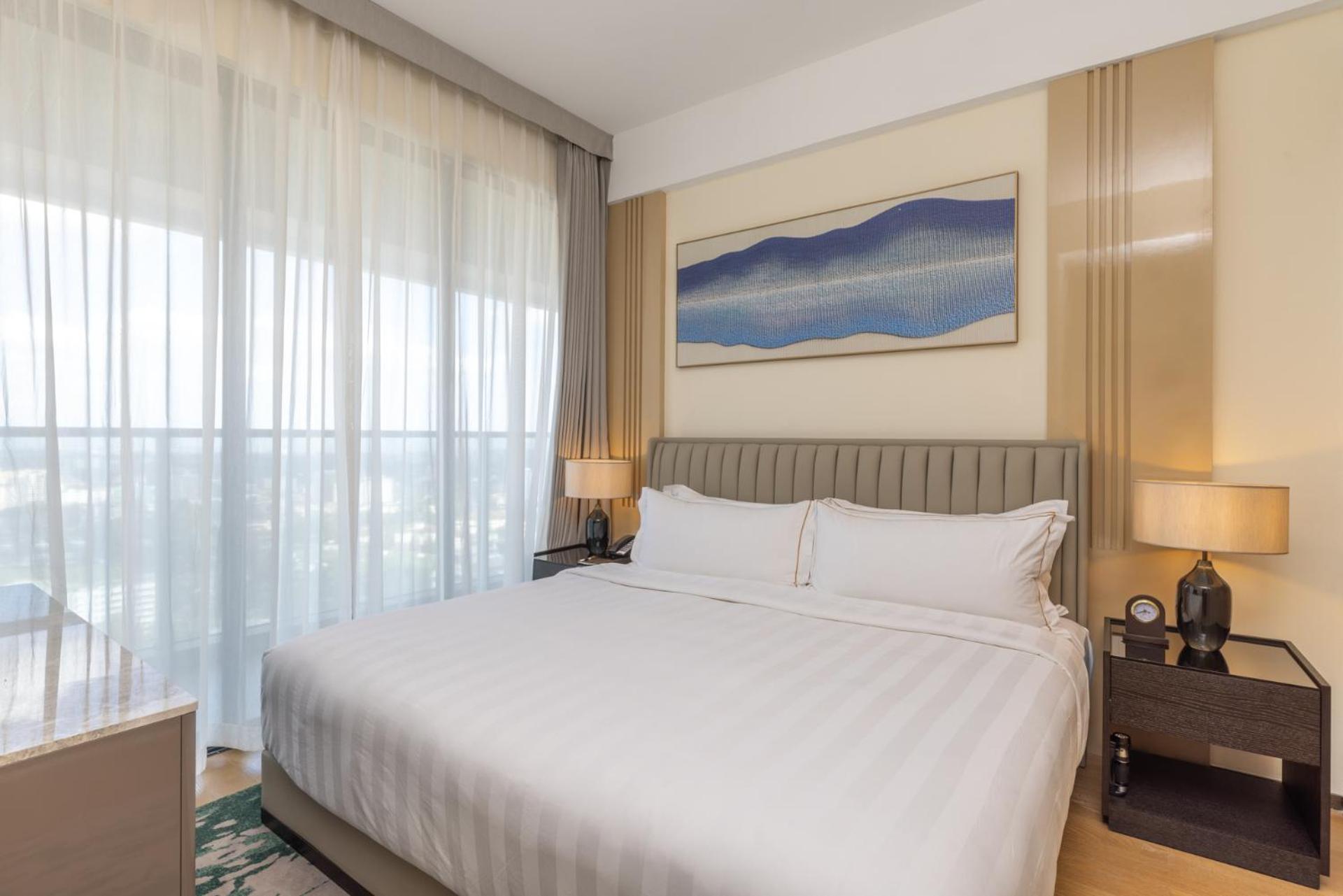 Two Bedroom Deluxe Suite King and Queen
