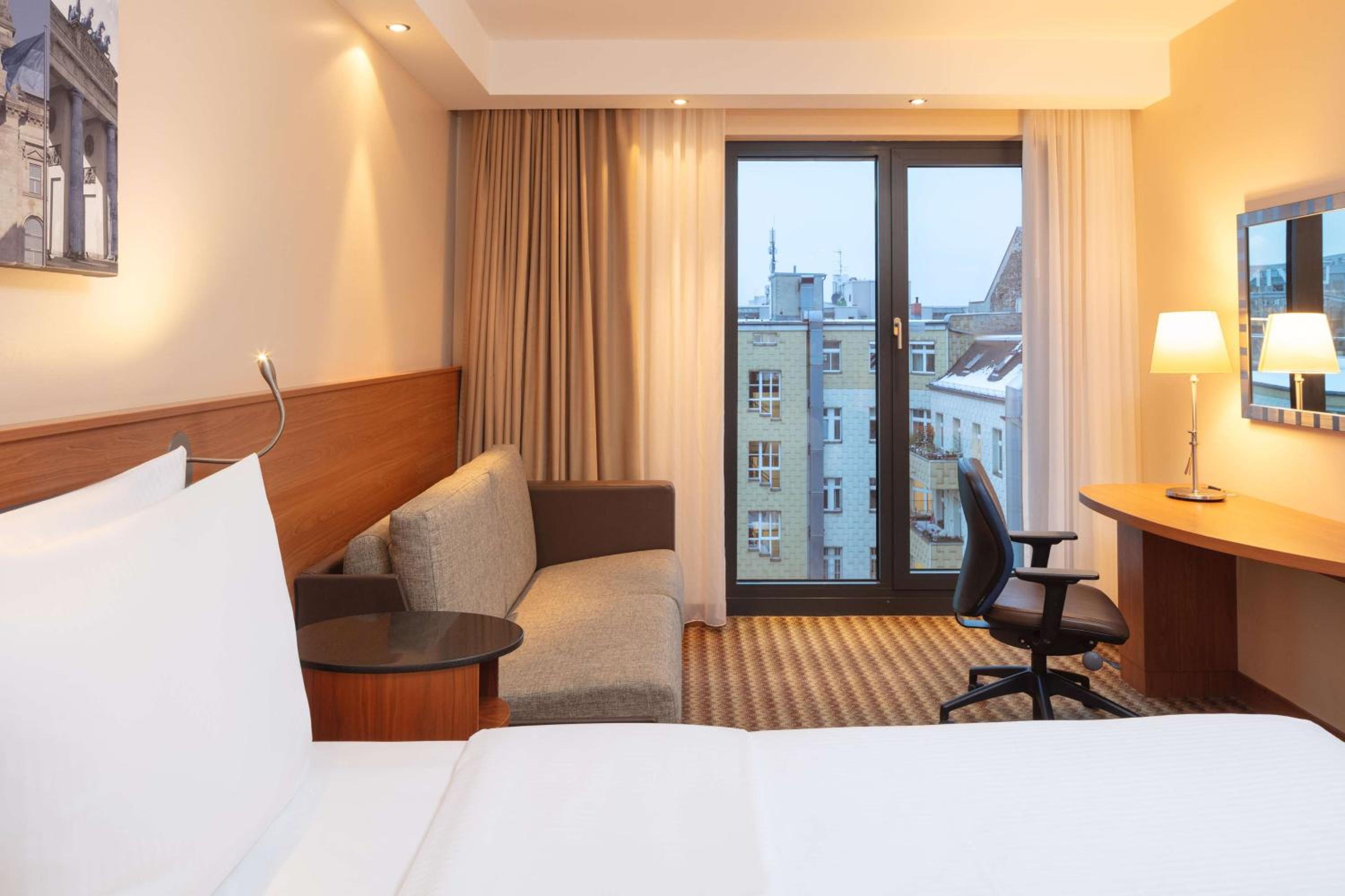 Standard Double Room with Comfort Sofa Bed and Courtyard View