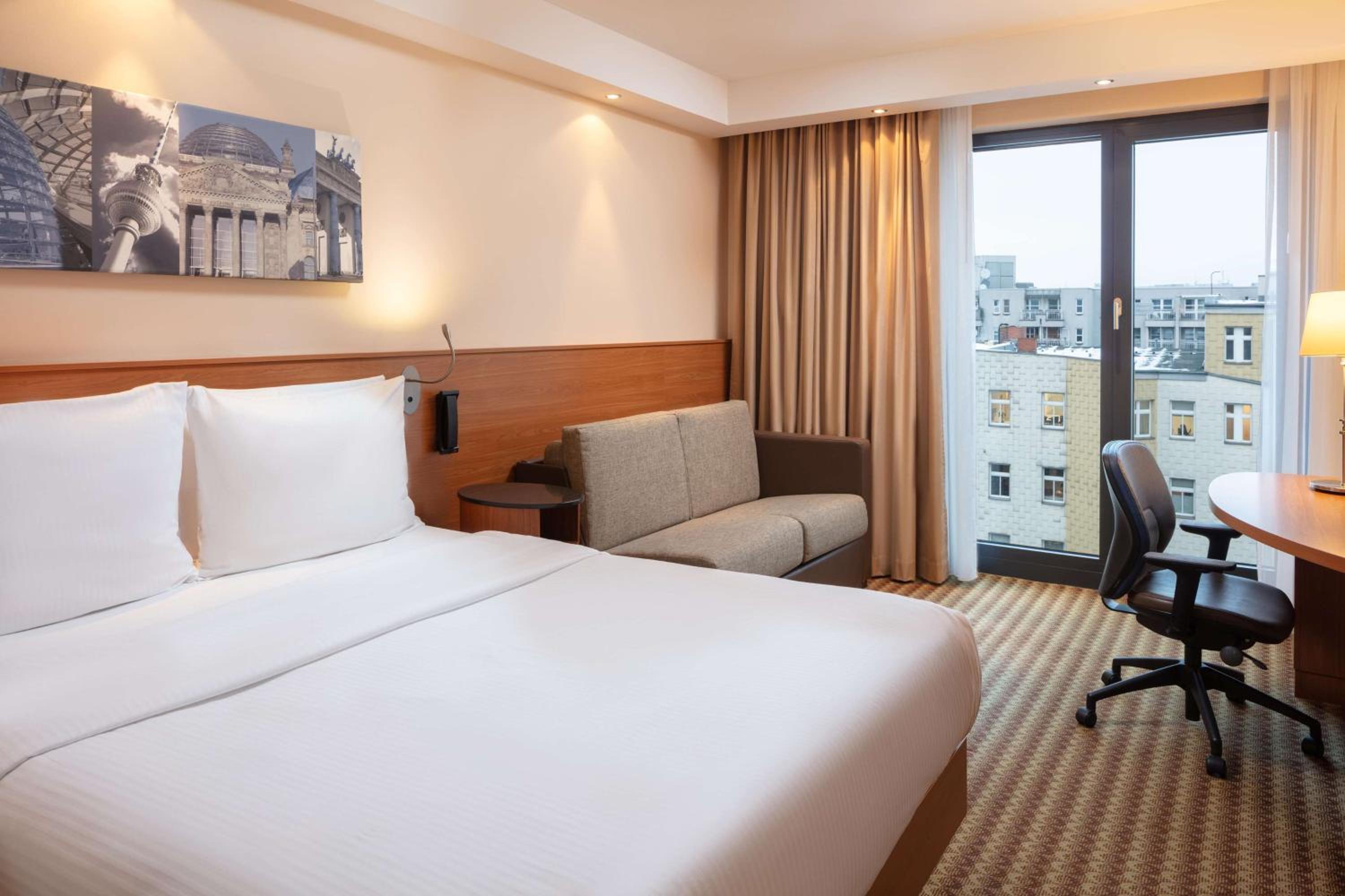 Standard Double Room with Comfort Sofa Bed and Courtyard View