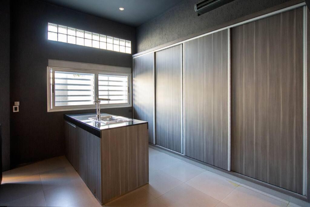 Three-Bedroom House photo 3
