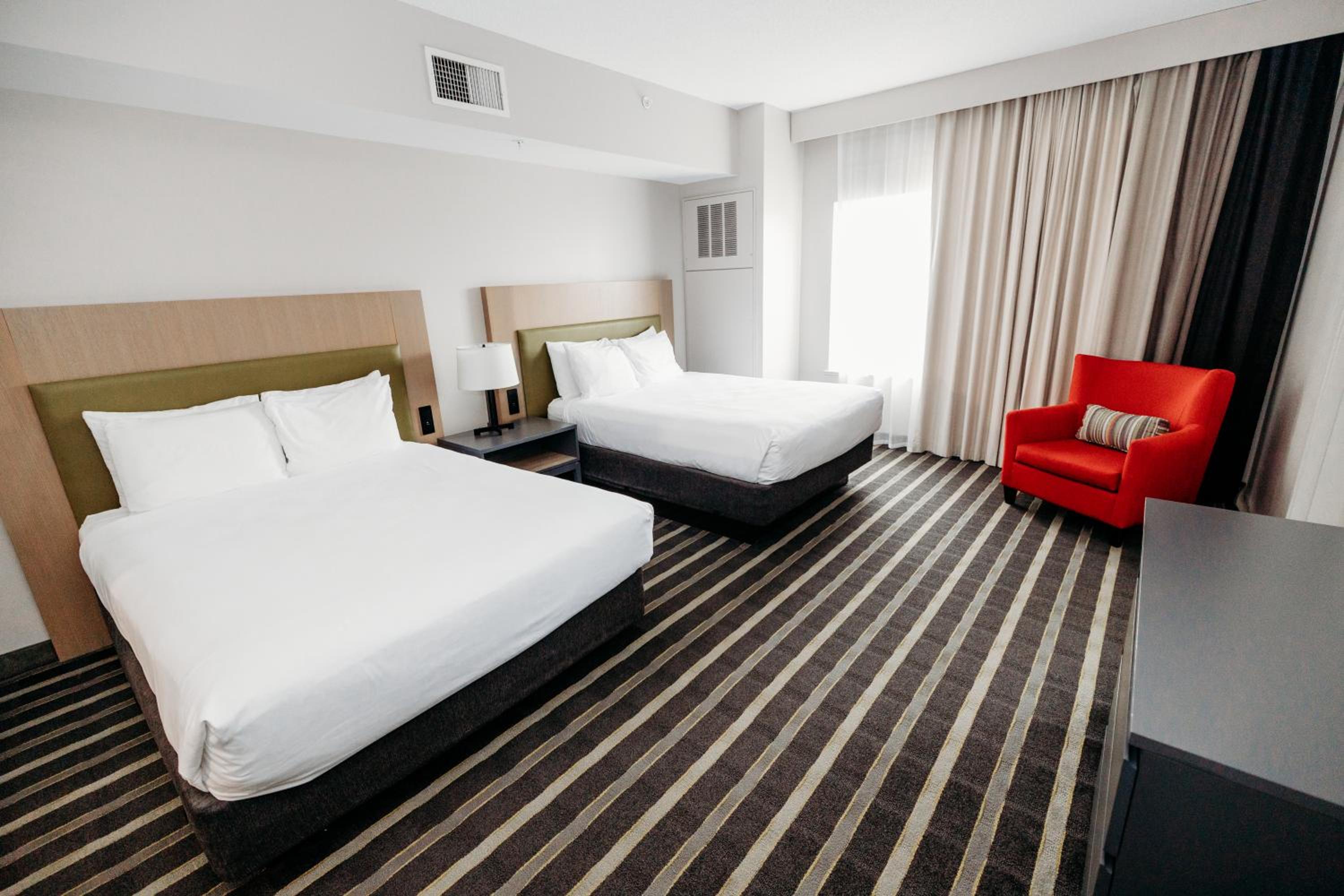 One-Bedroom Suite with Two Queen Beds and Sofa Bed - Disability Access photo 3