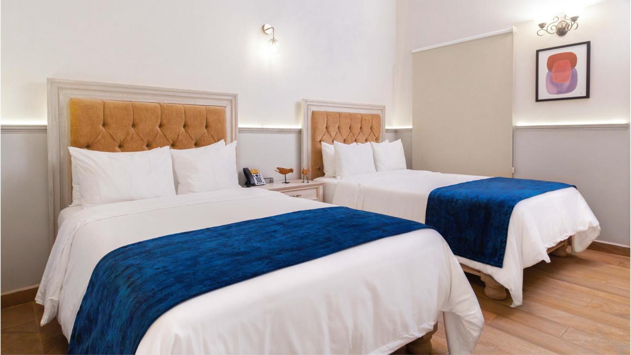 Grand Double Room with Two Double Beds - Photo 1
