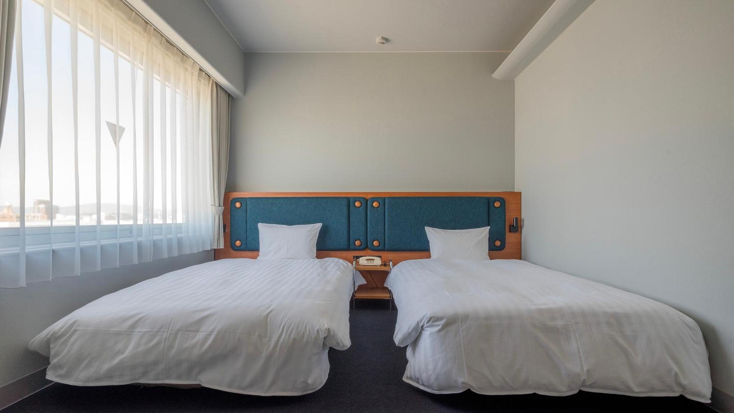 Twin Room - Photo 1