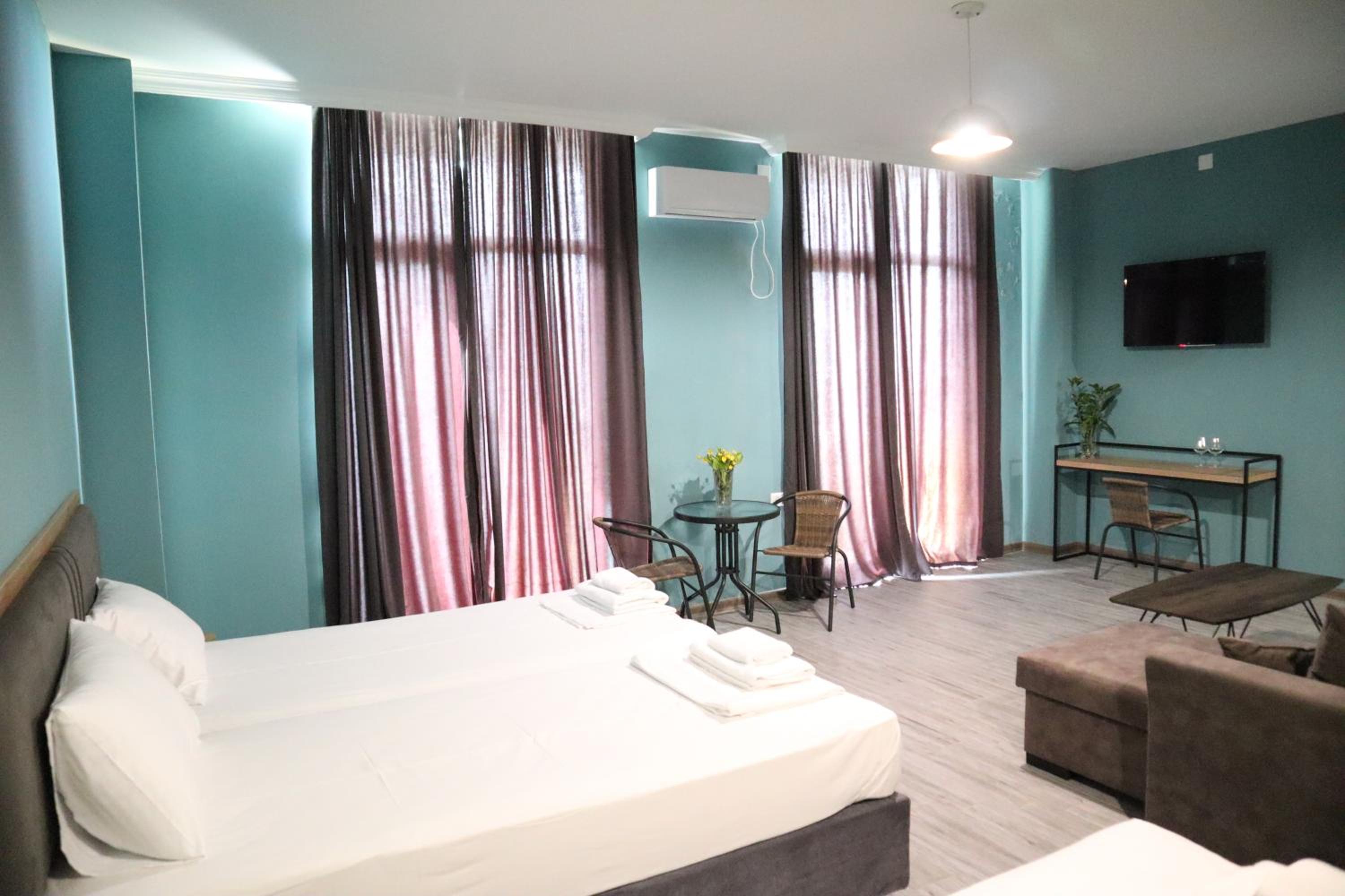 Quadruple Room with Balcony