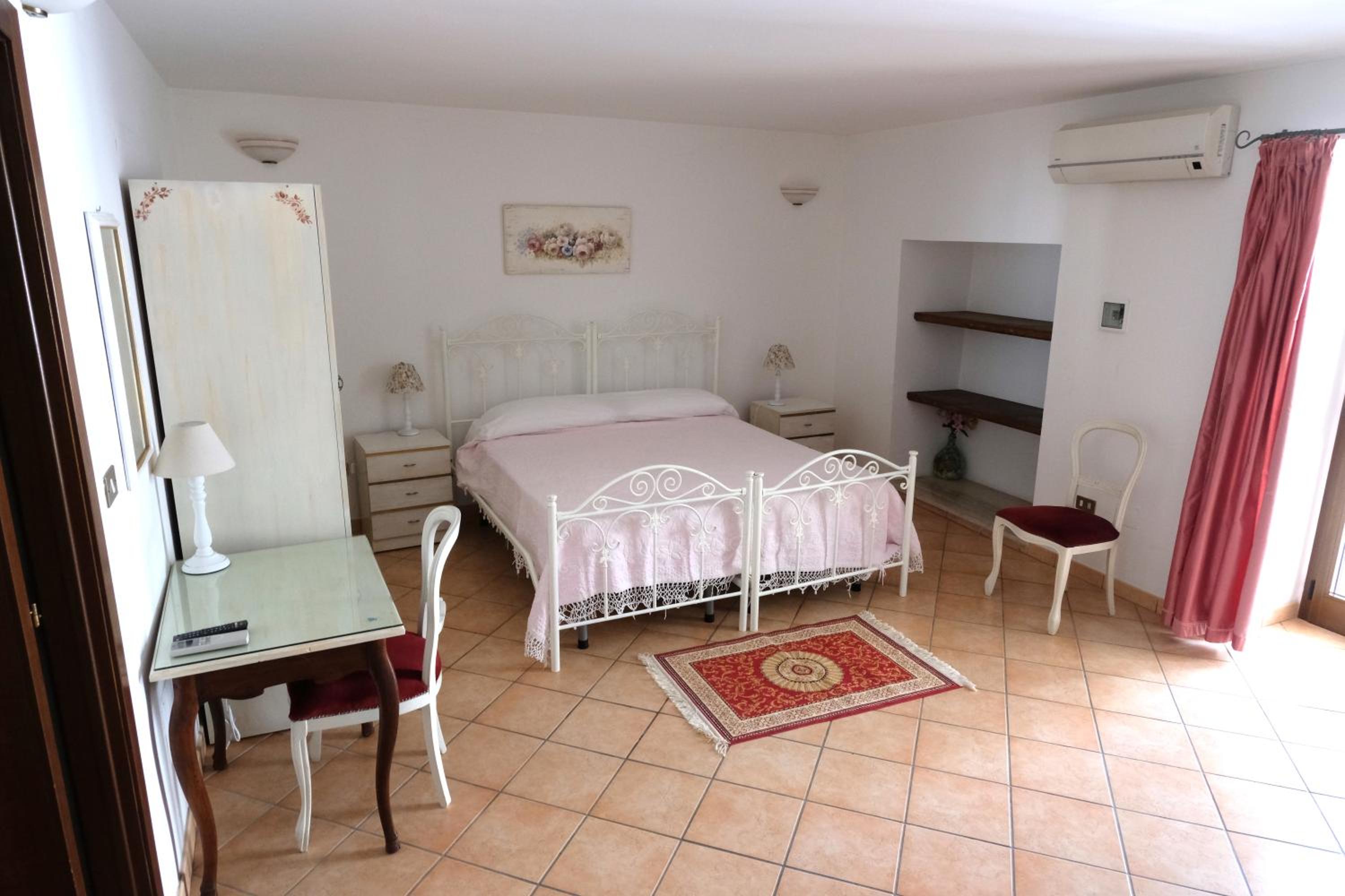 Quadruple Room with Private Bathroom photo 1