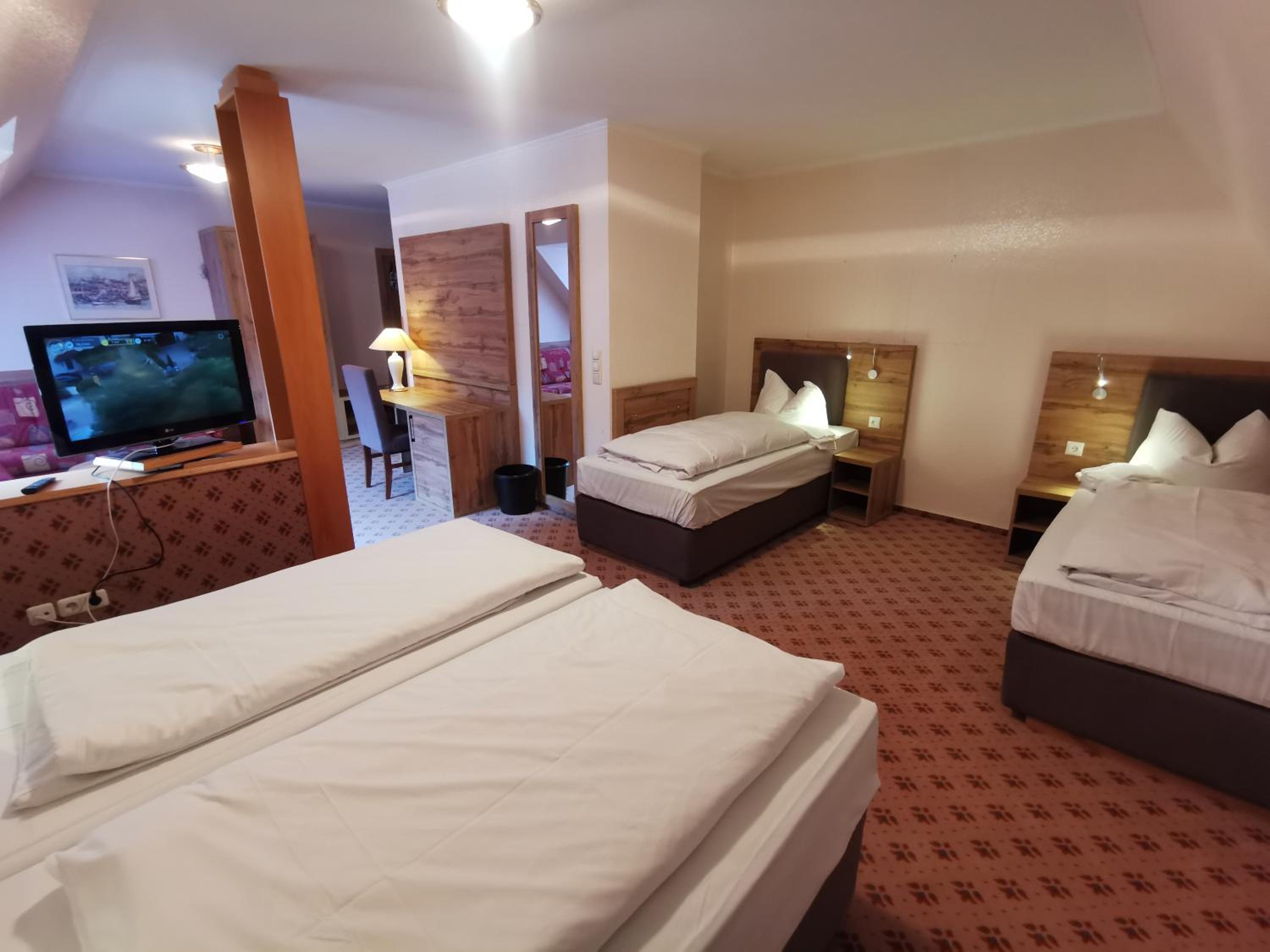 Standard Quadruple Room - Photo 1