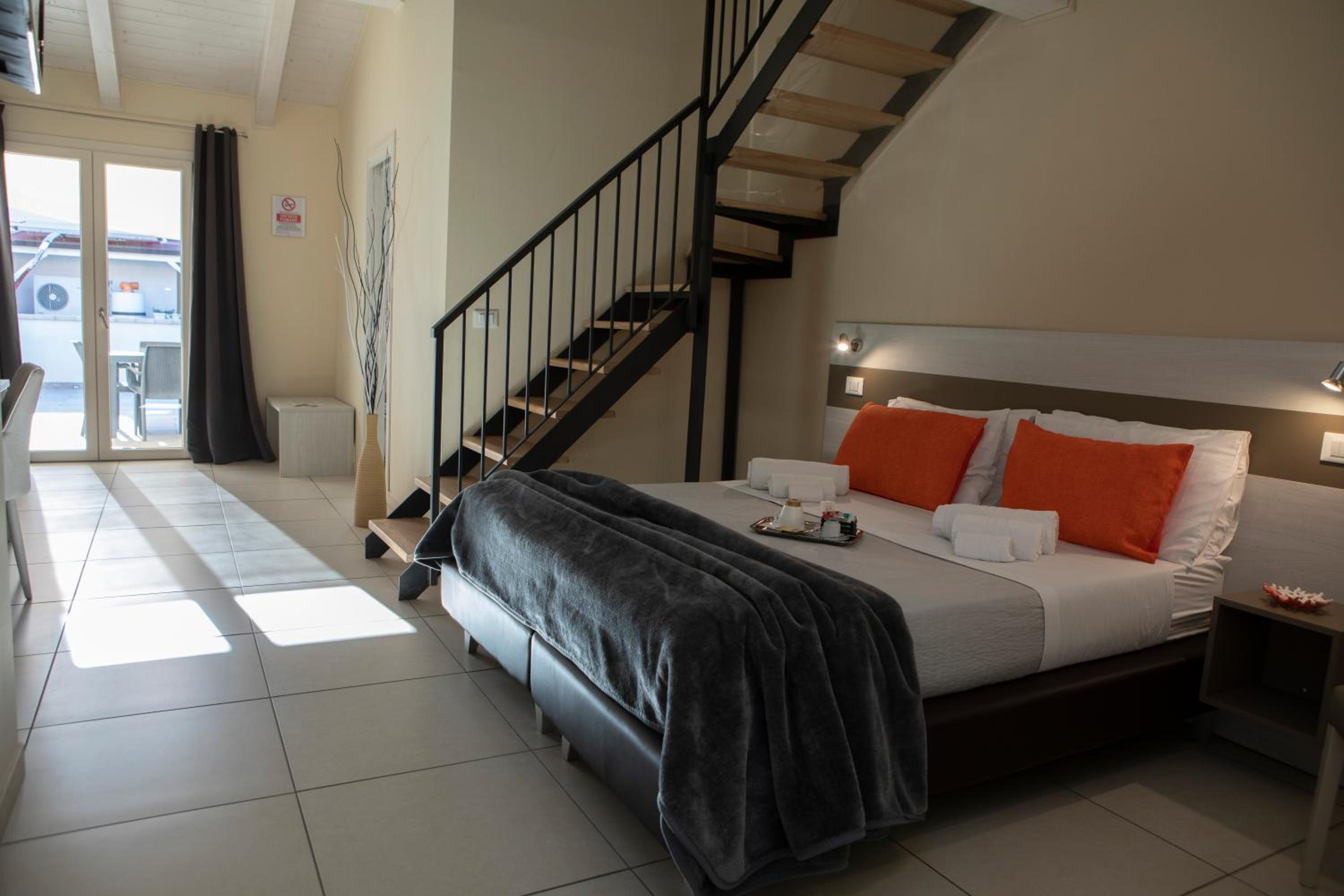 Quadruple Room with Private Bathroom