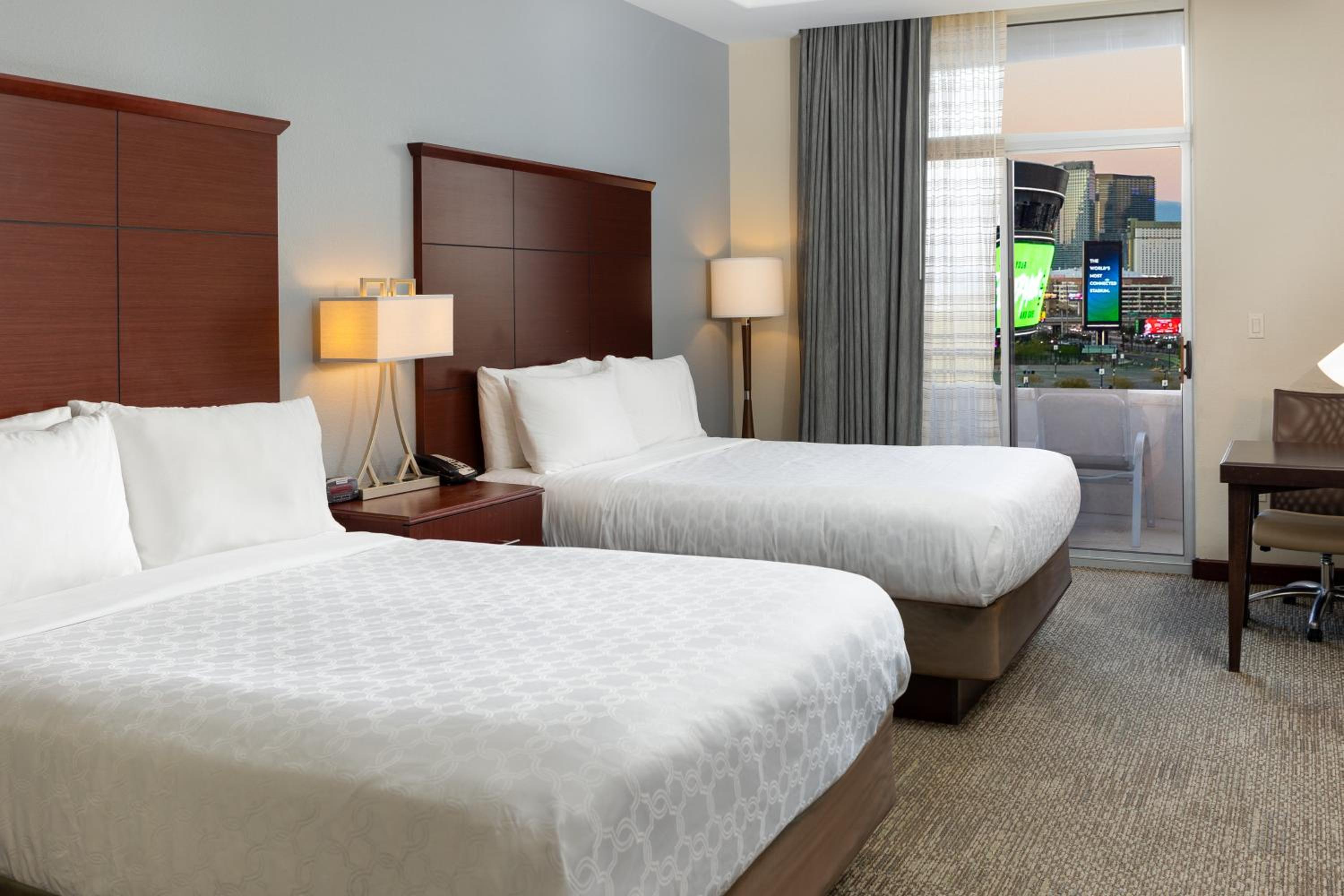 Studio Queen Suite with Two Queen Beds and City View - Photo 1
