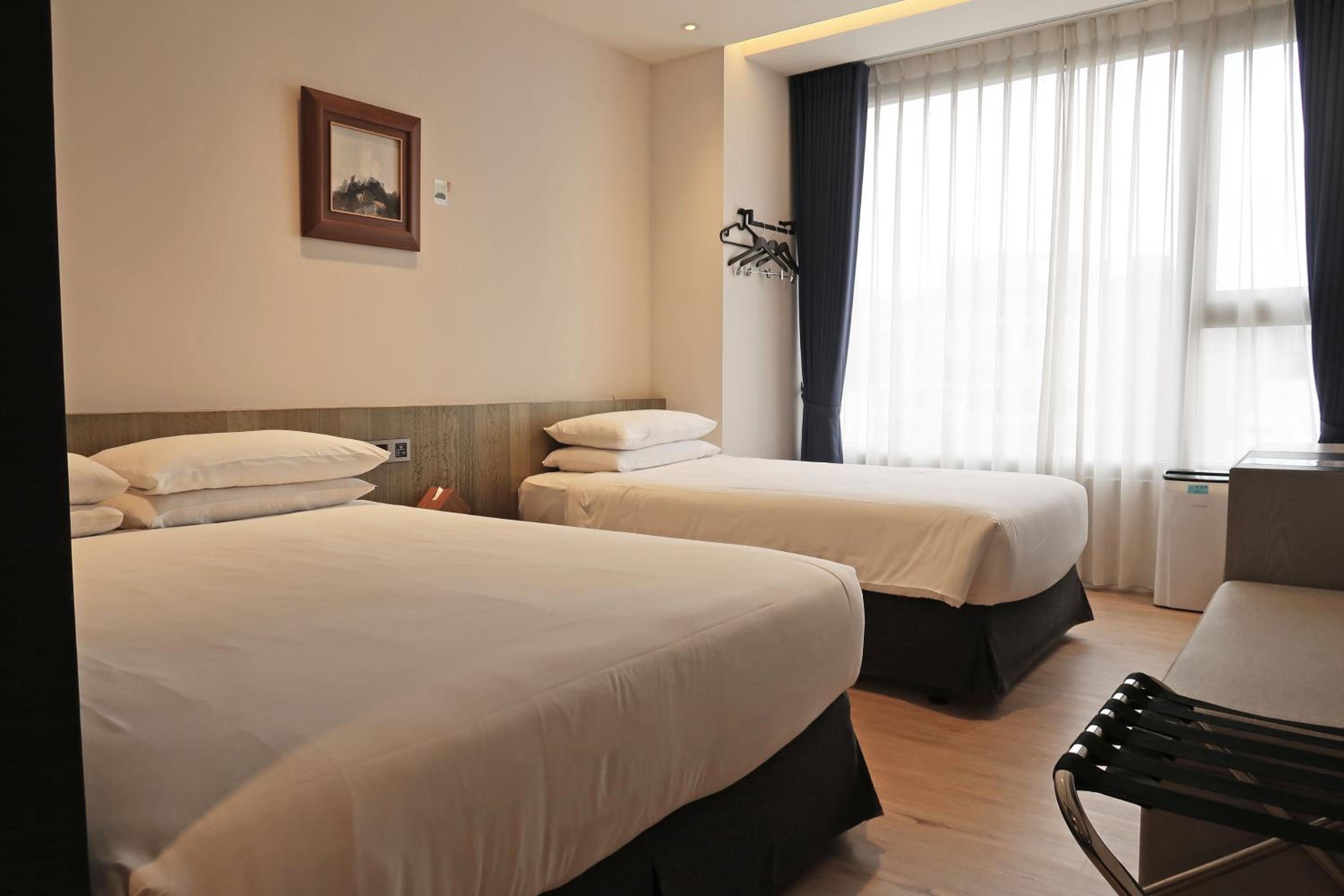Deluxe Triple Room - Photo 1