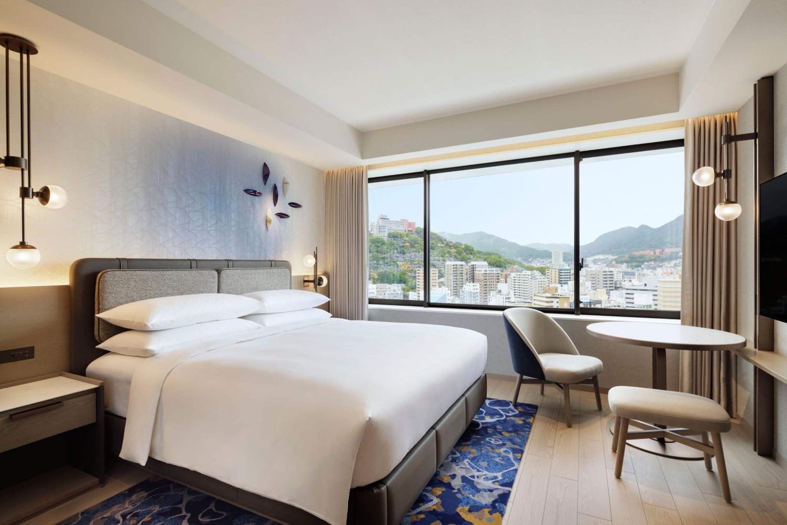 Deluxe King Room with City View - Photo 1