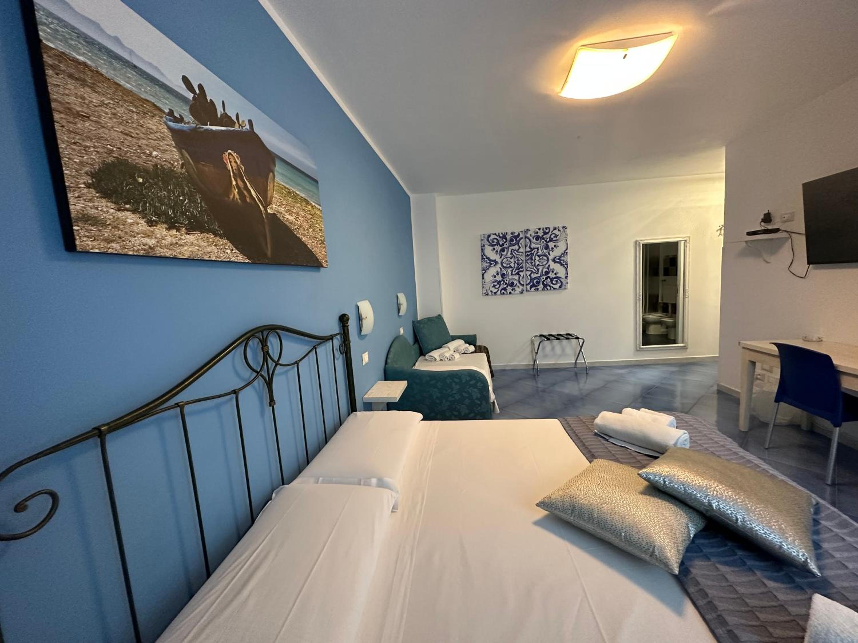 Quadruple Room with Balcony photo 3