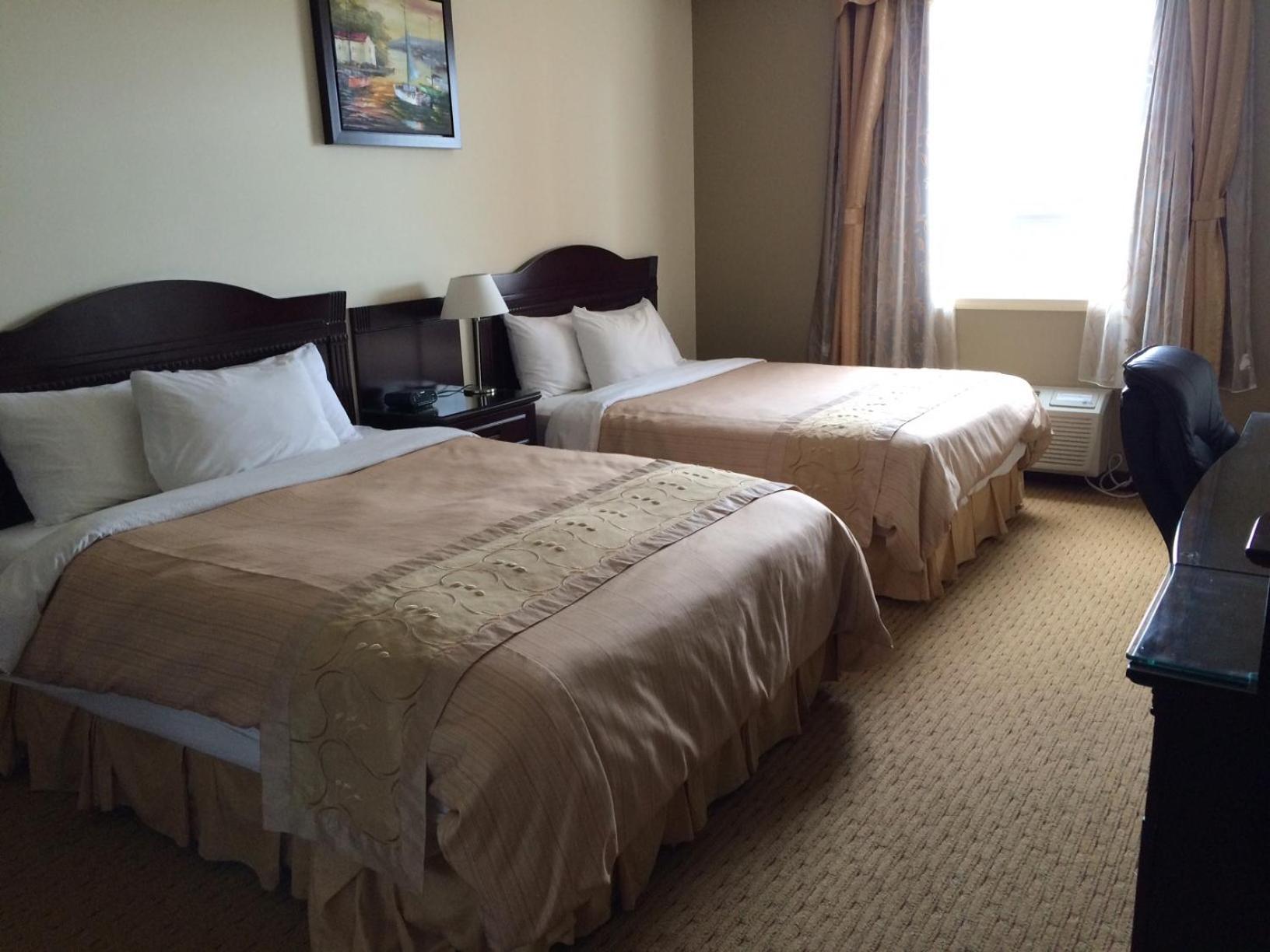 Deluxe Queen Studio with Two Queen Beds - Non-Smoking - Photo 1