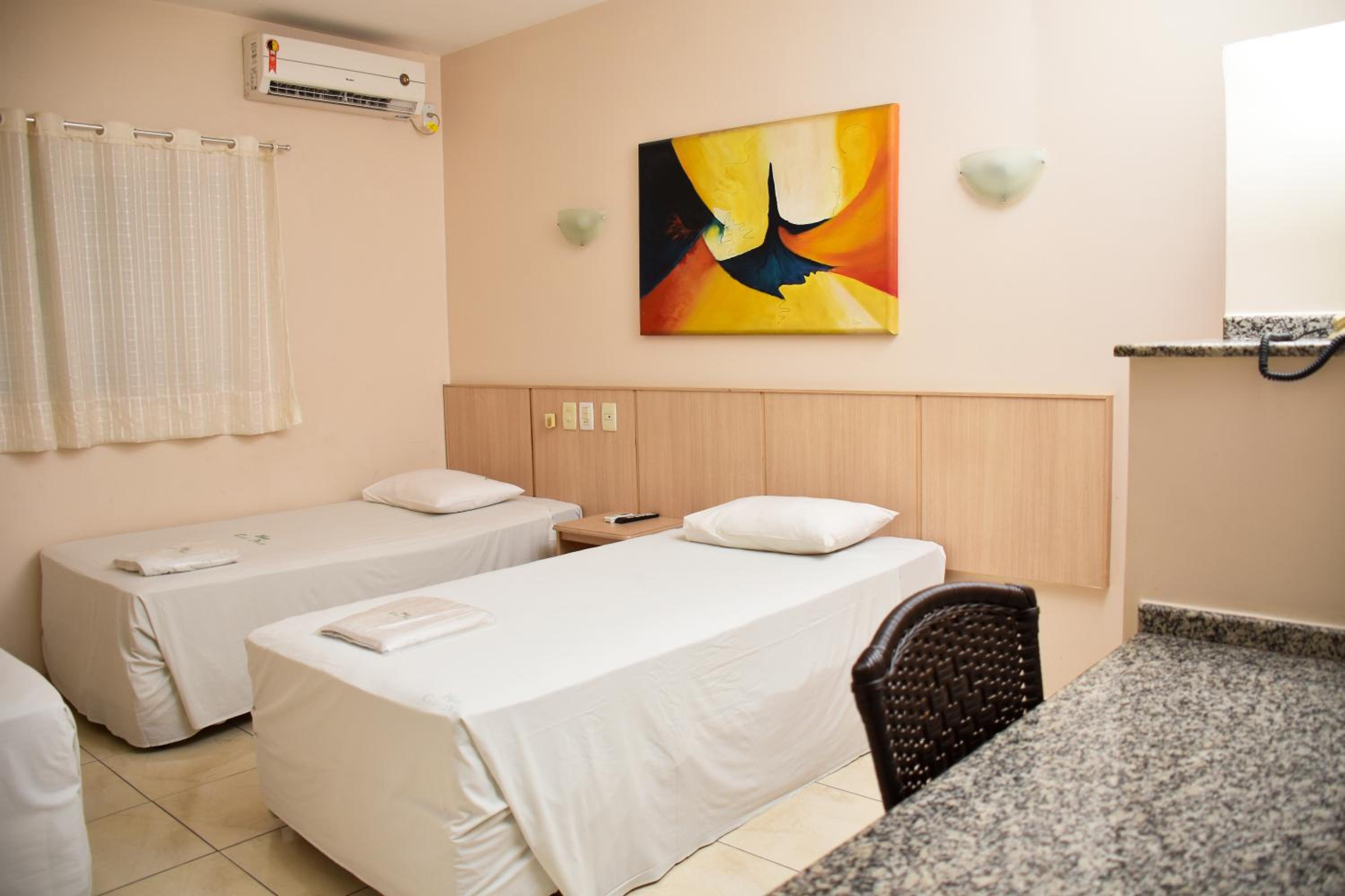 Economy Triple Room photo 2