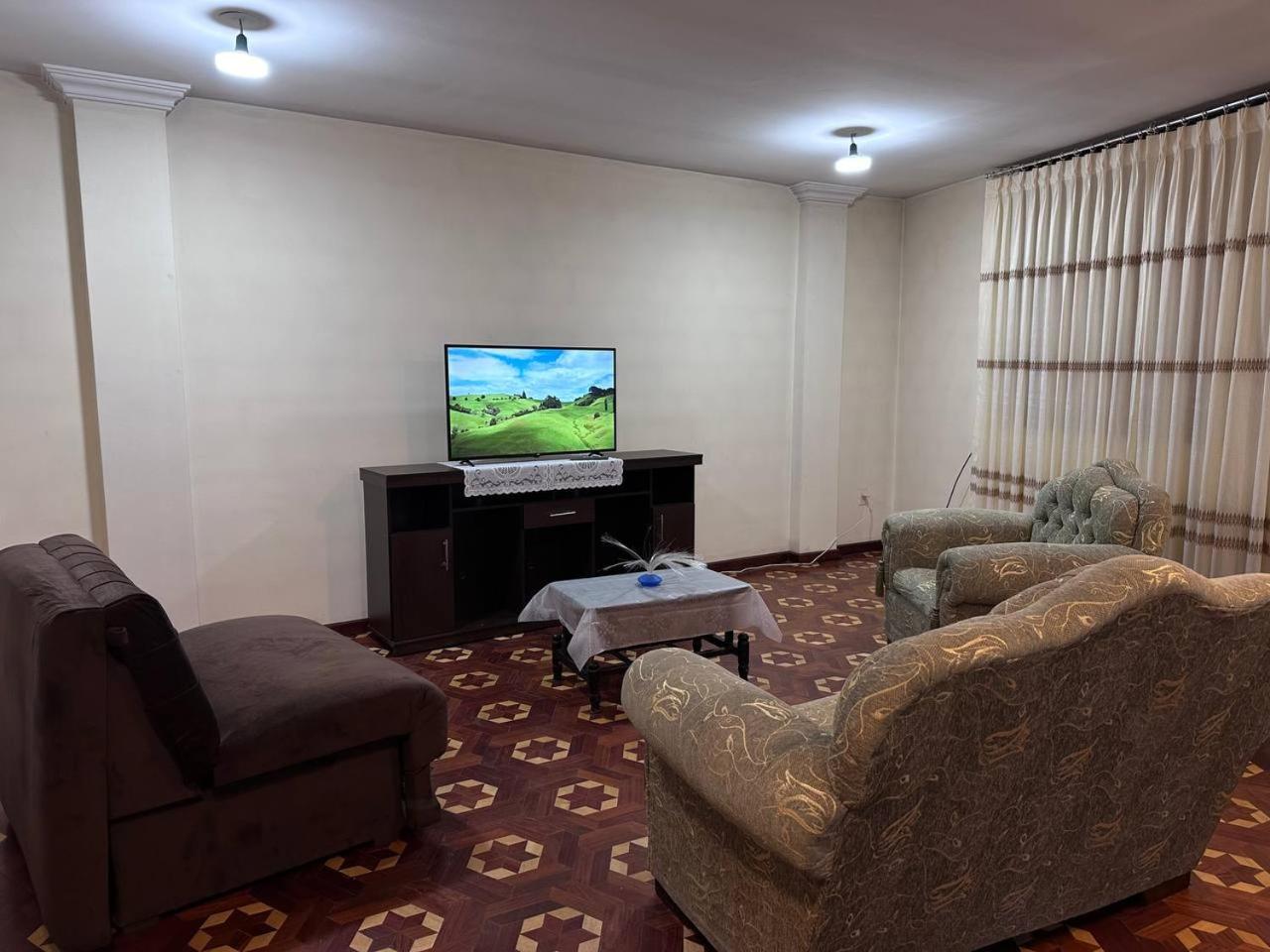 Three-Bedroom Apartment photo 1