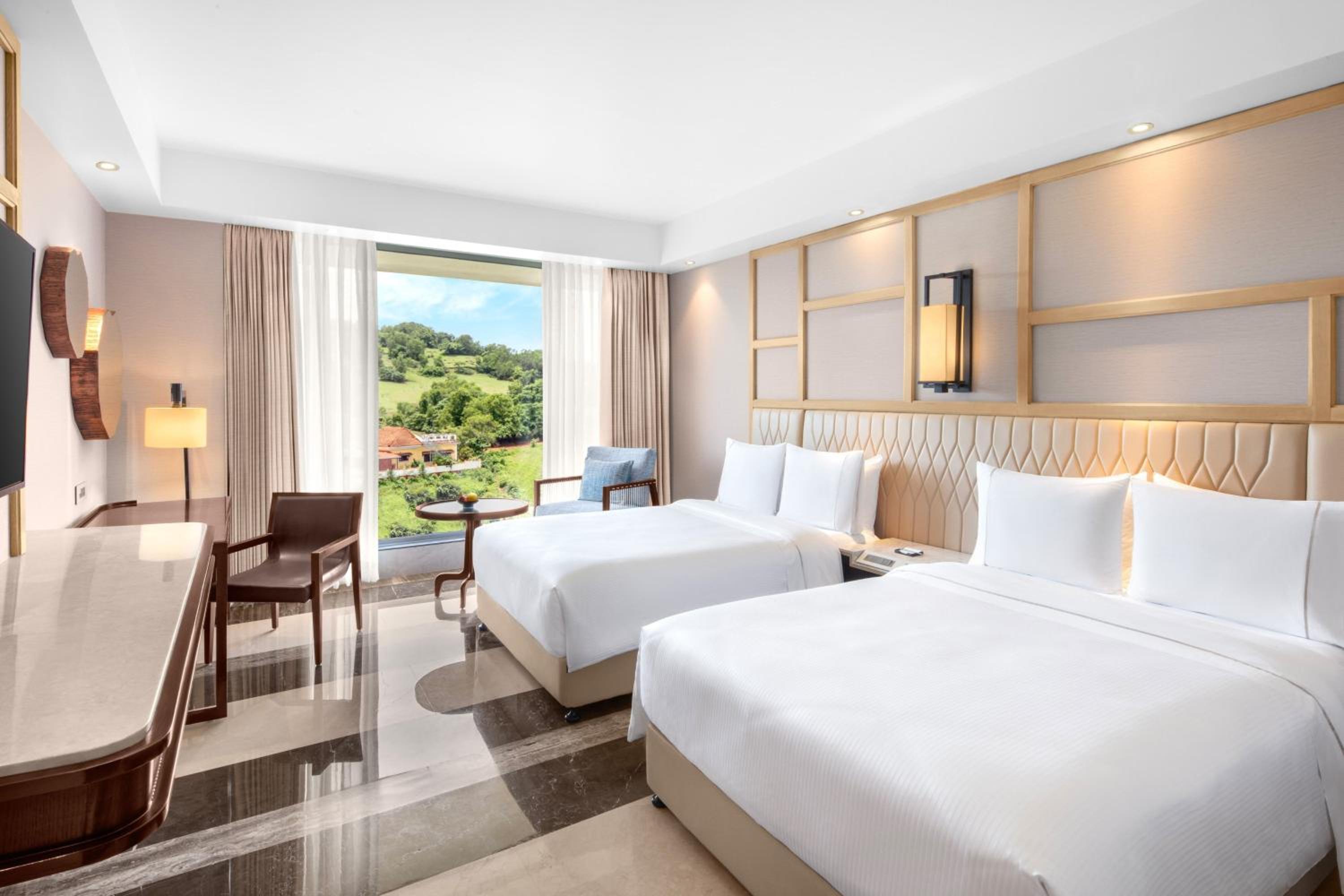 Deluxe Guest Room, 2 Queen Beds with Bathtub  - INR 1000 SPA Credit (Stay between Sunday to Thursday)  - Complimentary beer on arrival and free shuttle to the beach photo 3