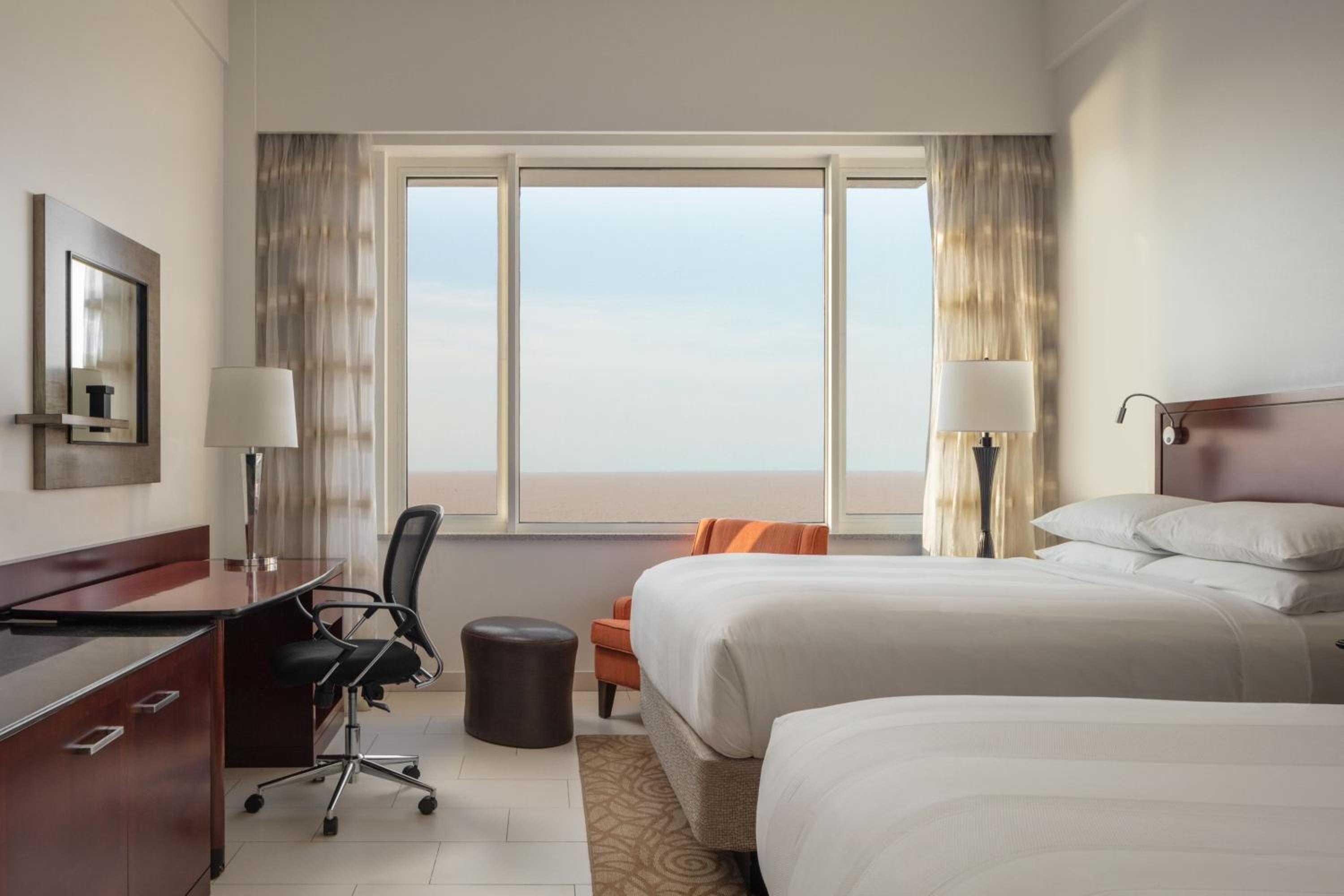 Deluxe Guest Room with Two Double Beds and Ocean View photo 2