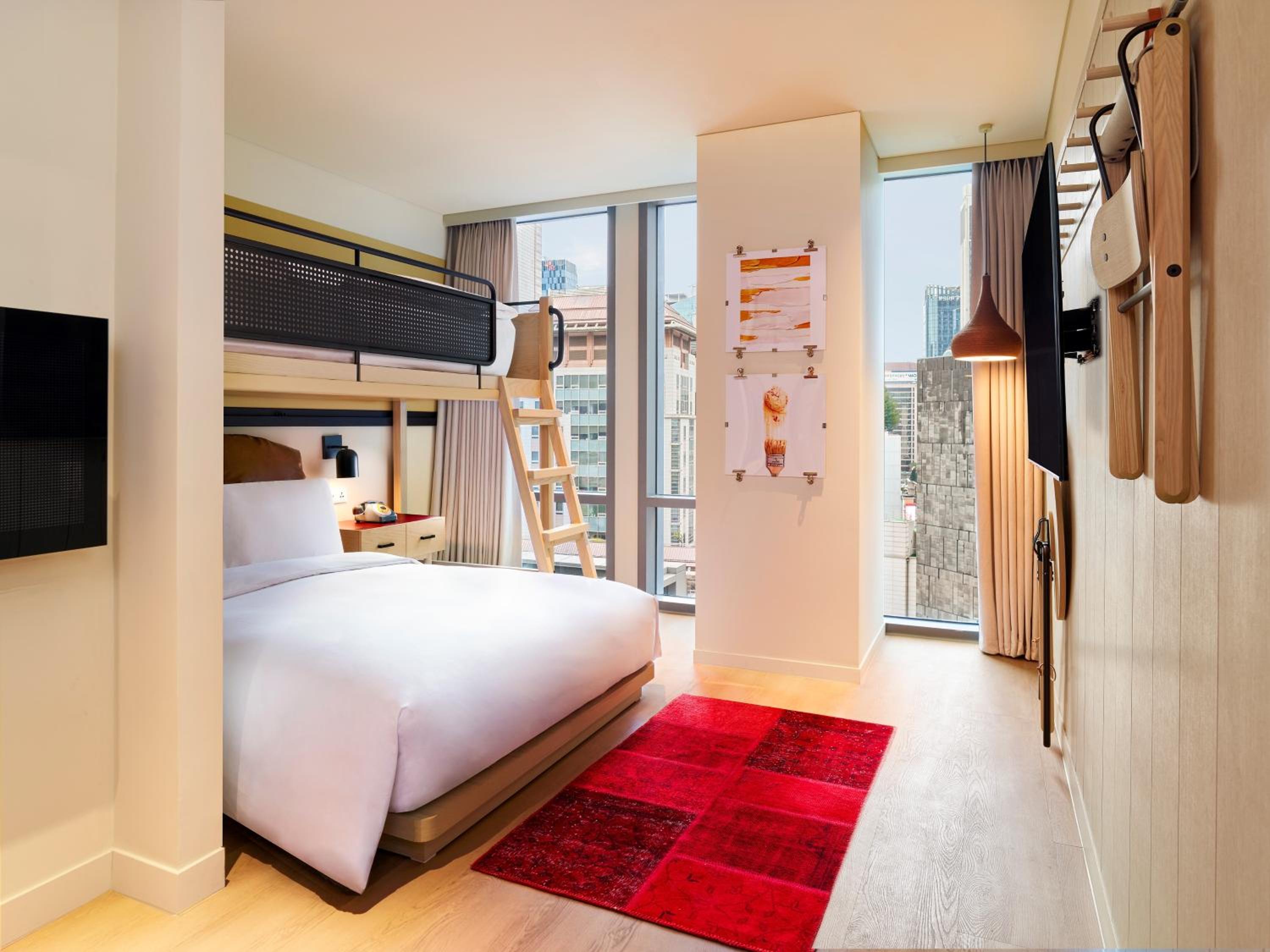 Queen and Single bed in loft and city view