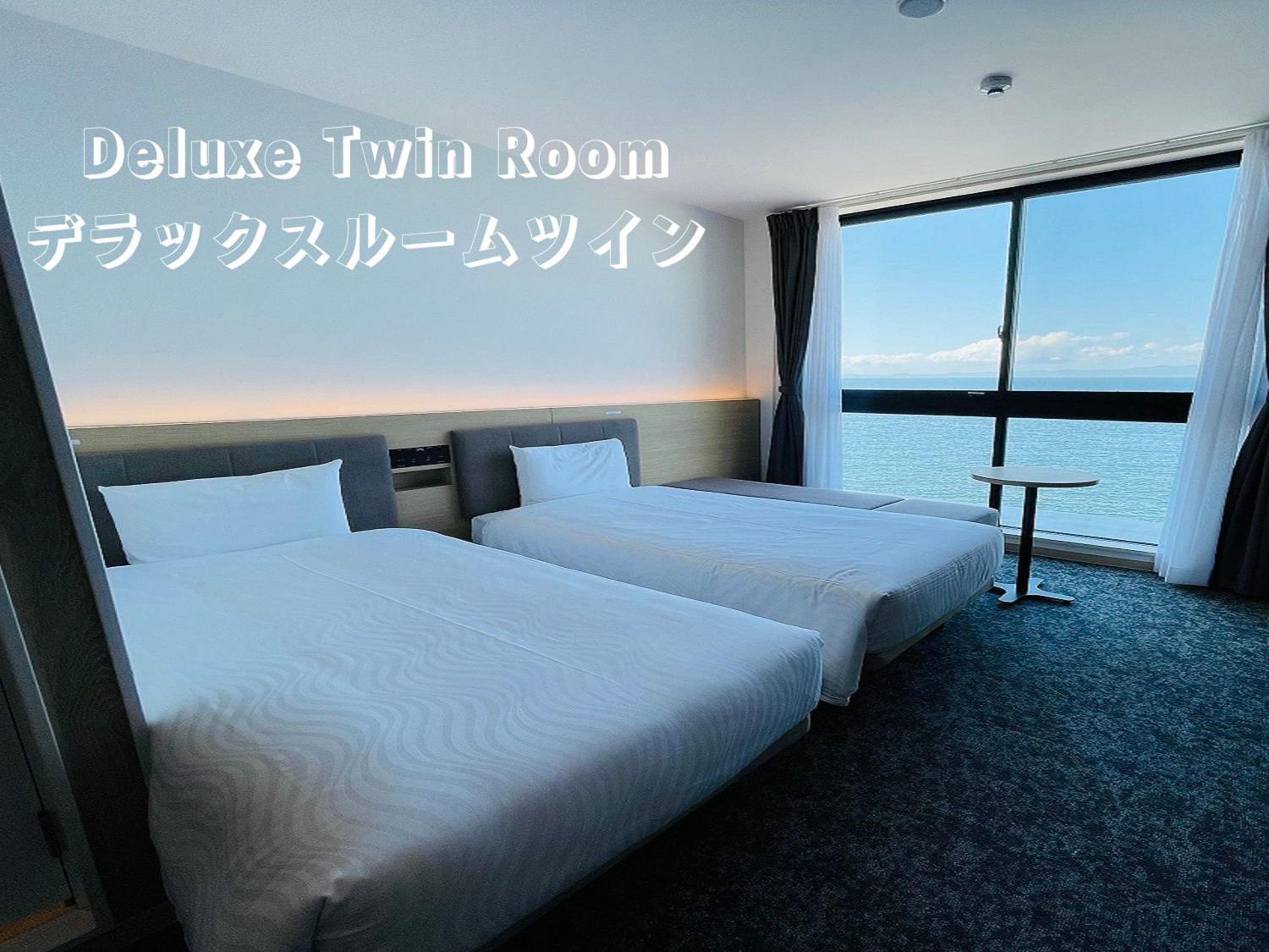 Deluxe Twin Room with Ocean View - Photo 1