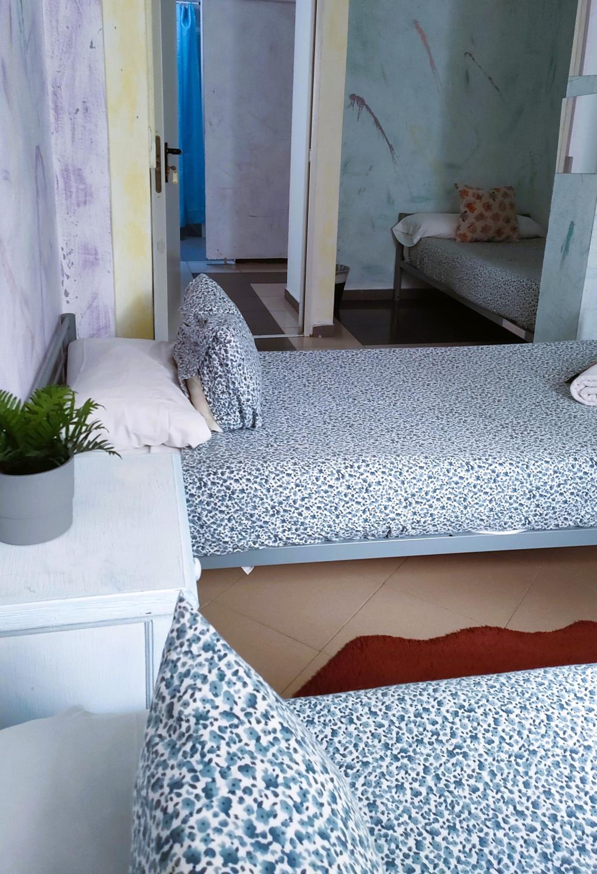 Habitación Triple Básica con Baño Compartido