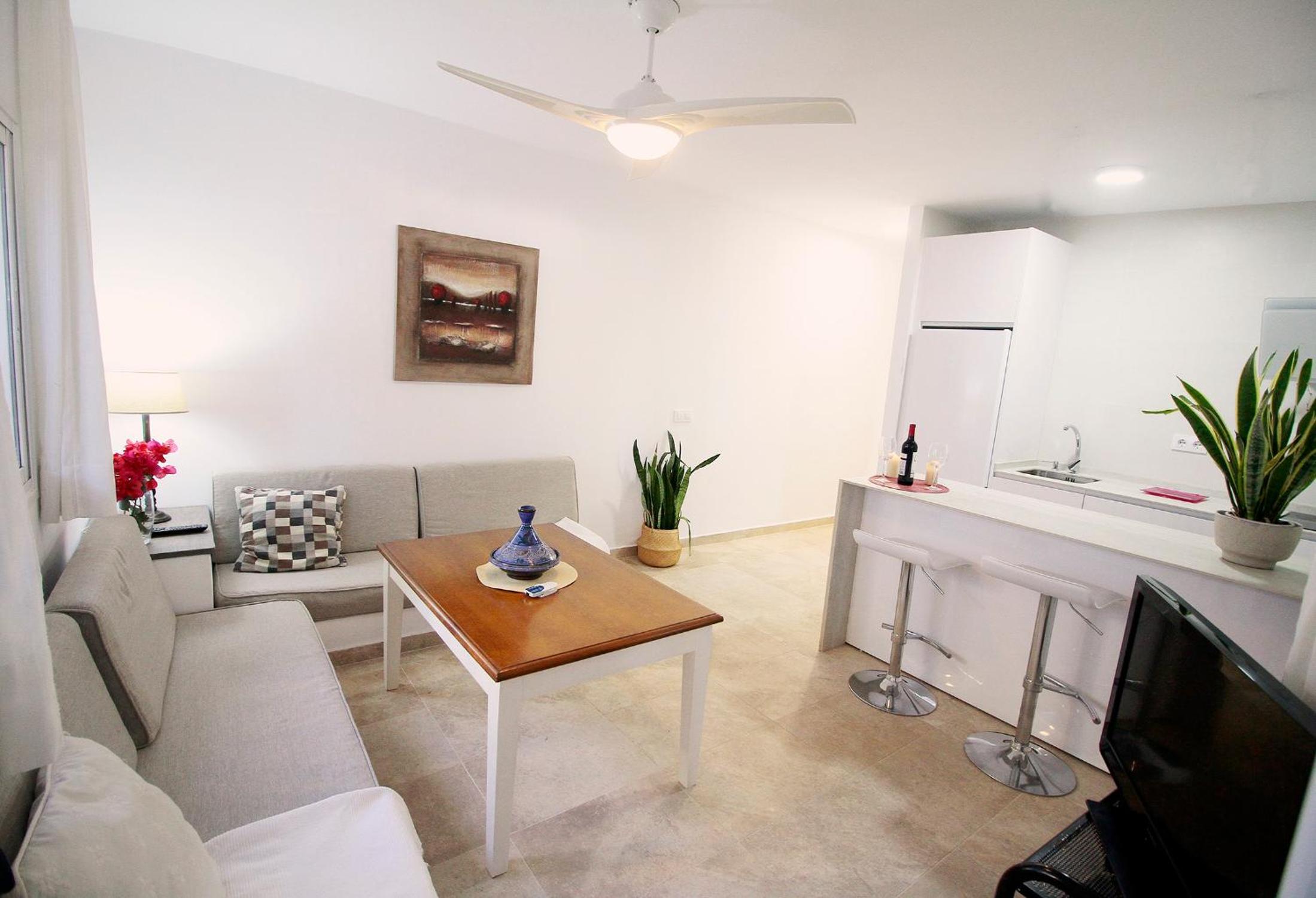 Casa de una habitación con terraza.