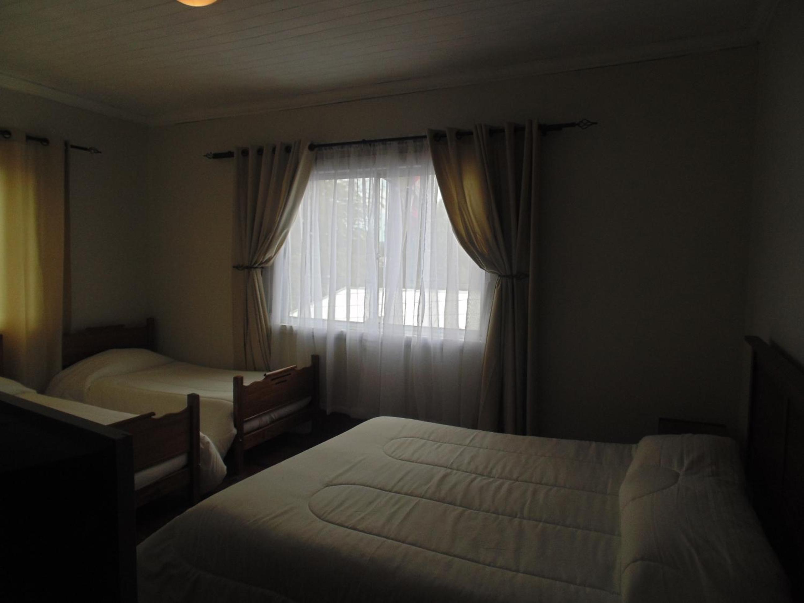 Quadruple Room with Private Bathroom photo 1