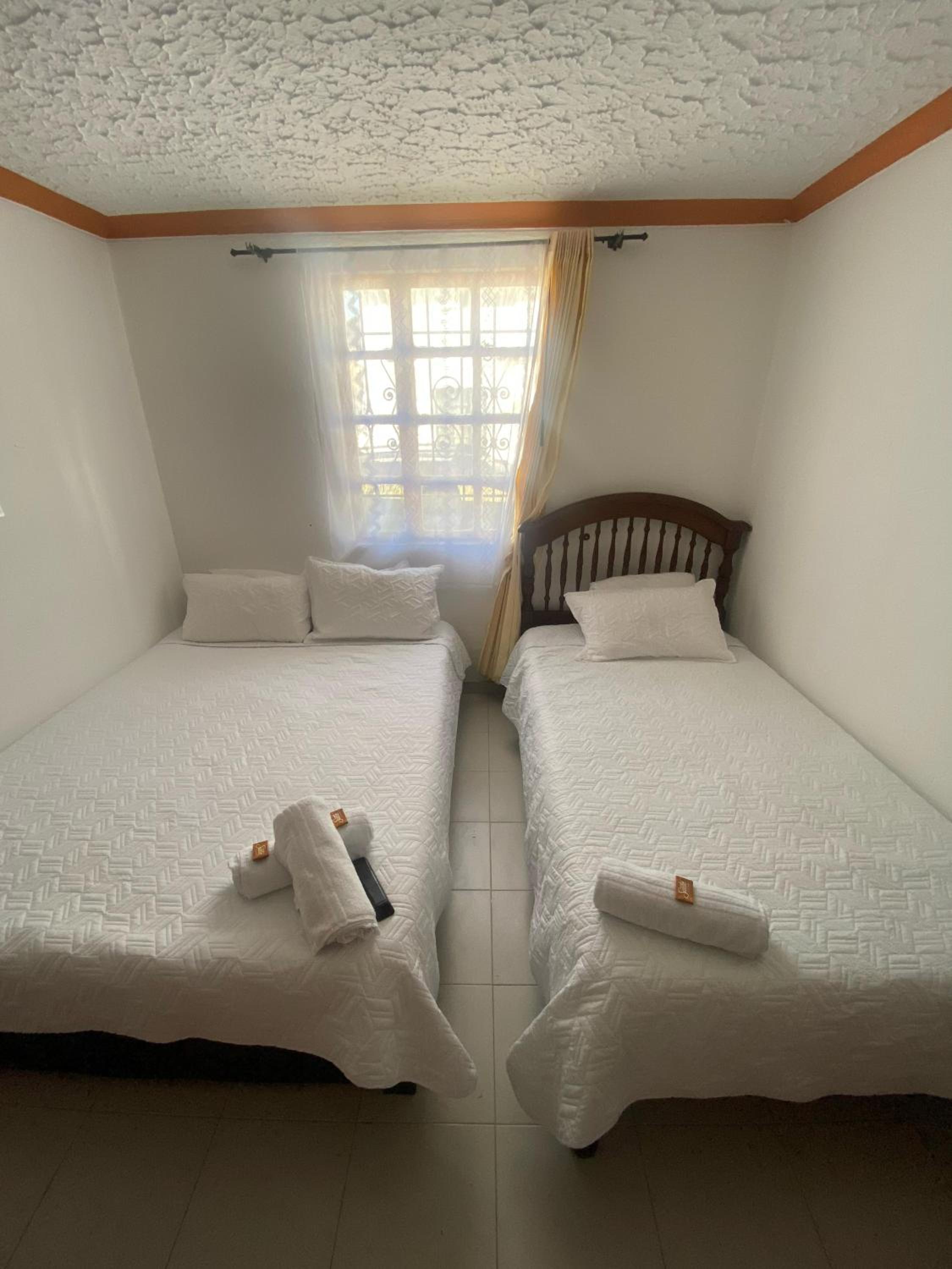 Basic Triple Room with Shared Bathroom photo 1