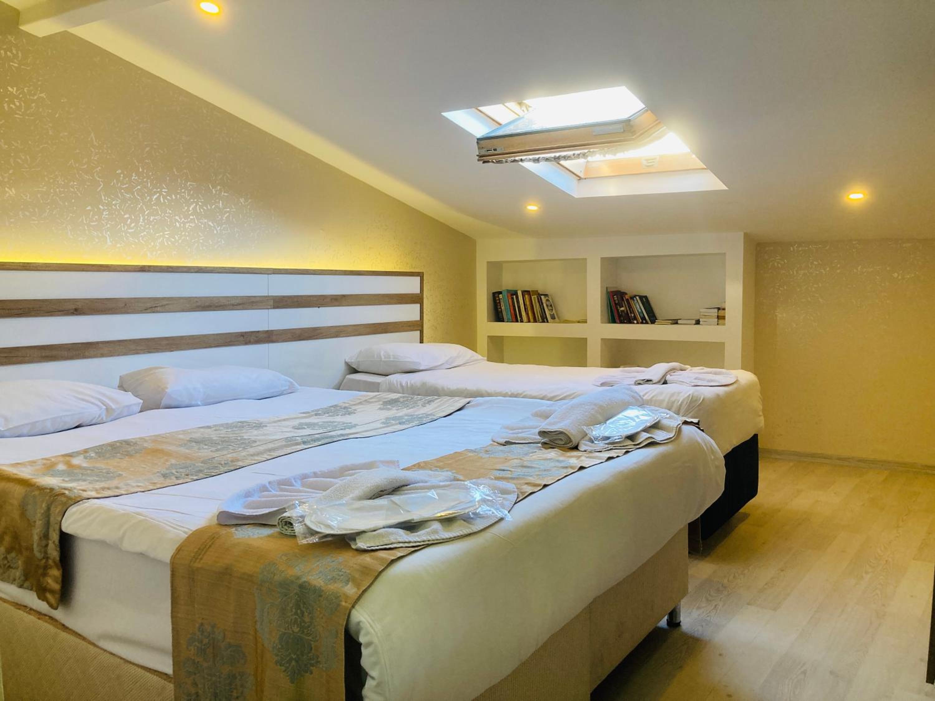 Economy Triple Room - Third Floor photo 1