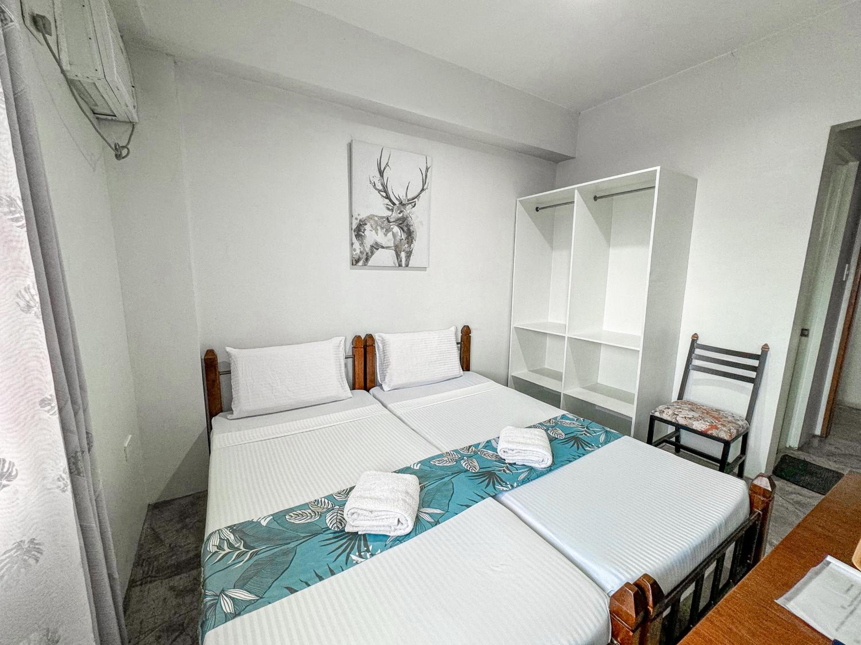 Deluxe Twin Room - Photo 10