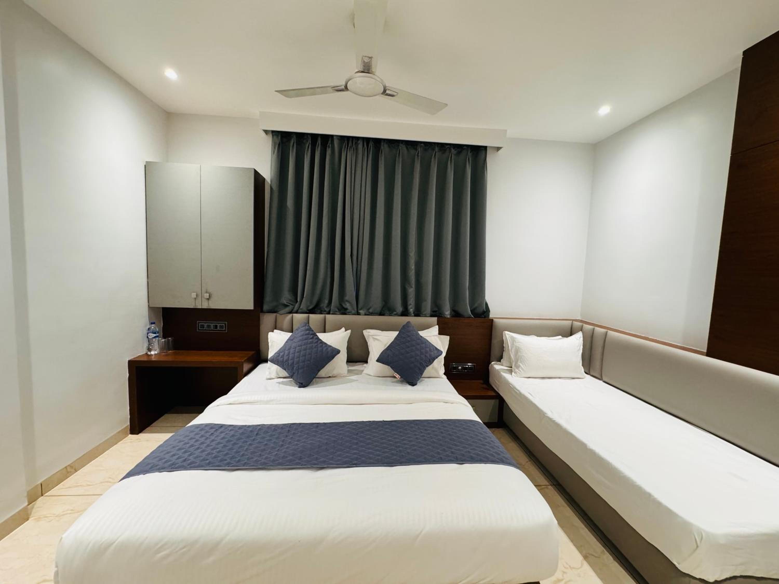 Deluxe Triple Room - Photo 2