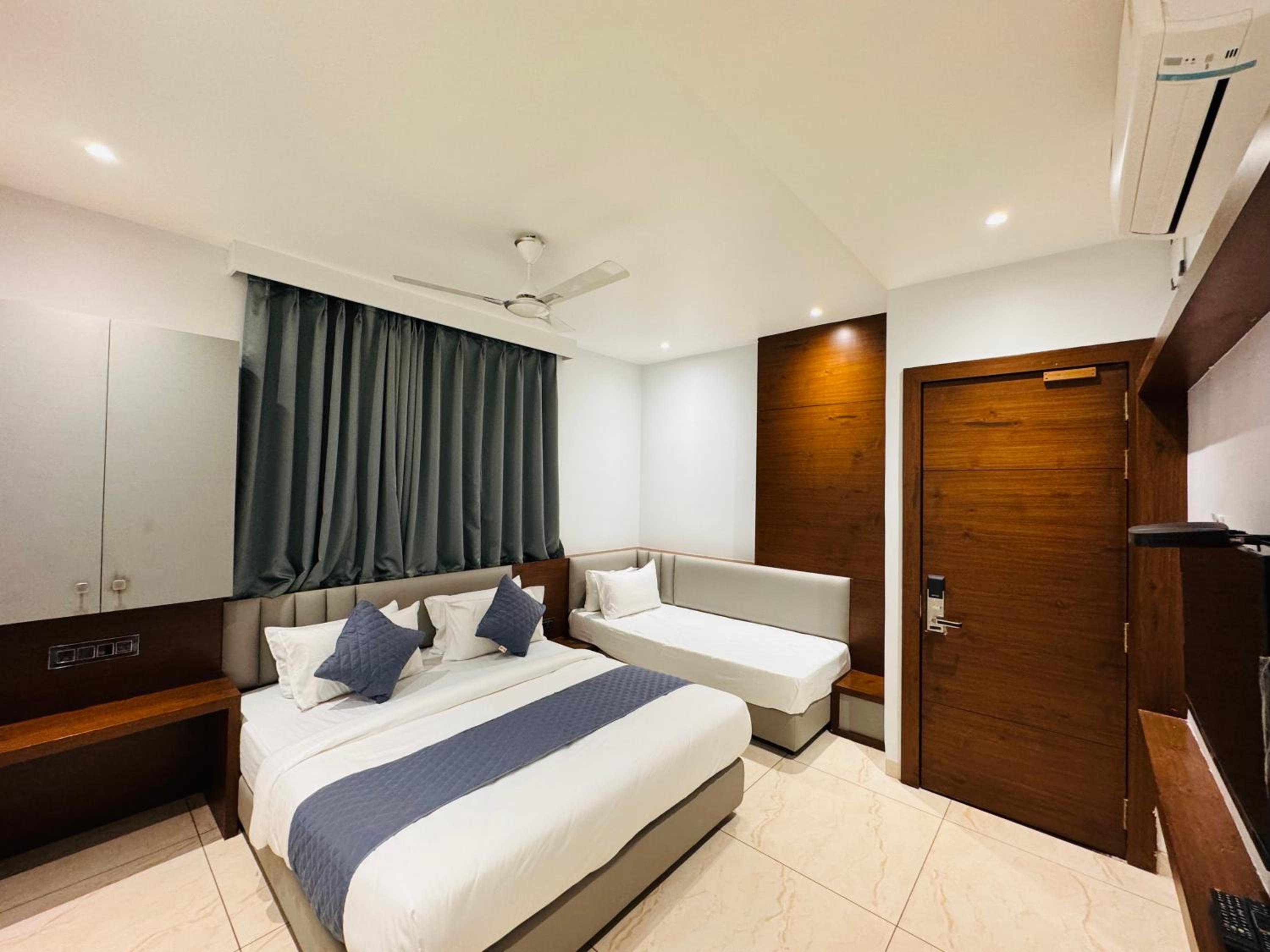 Deluxe Triple Room - Photo 5