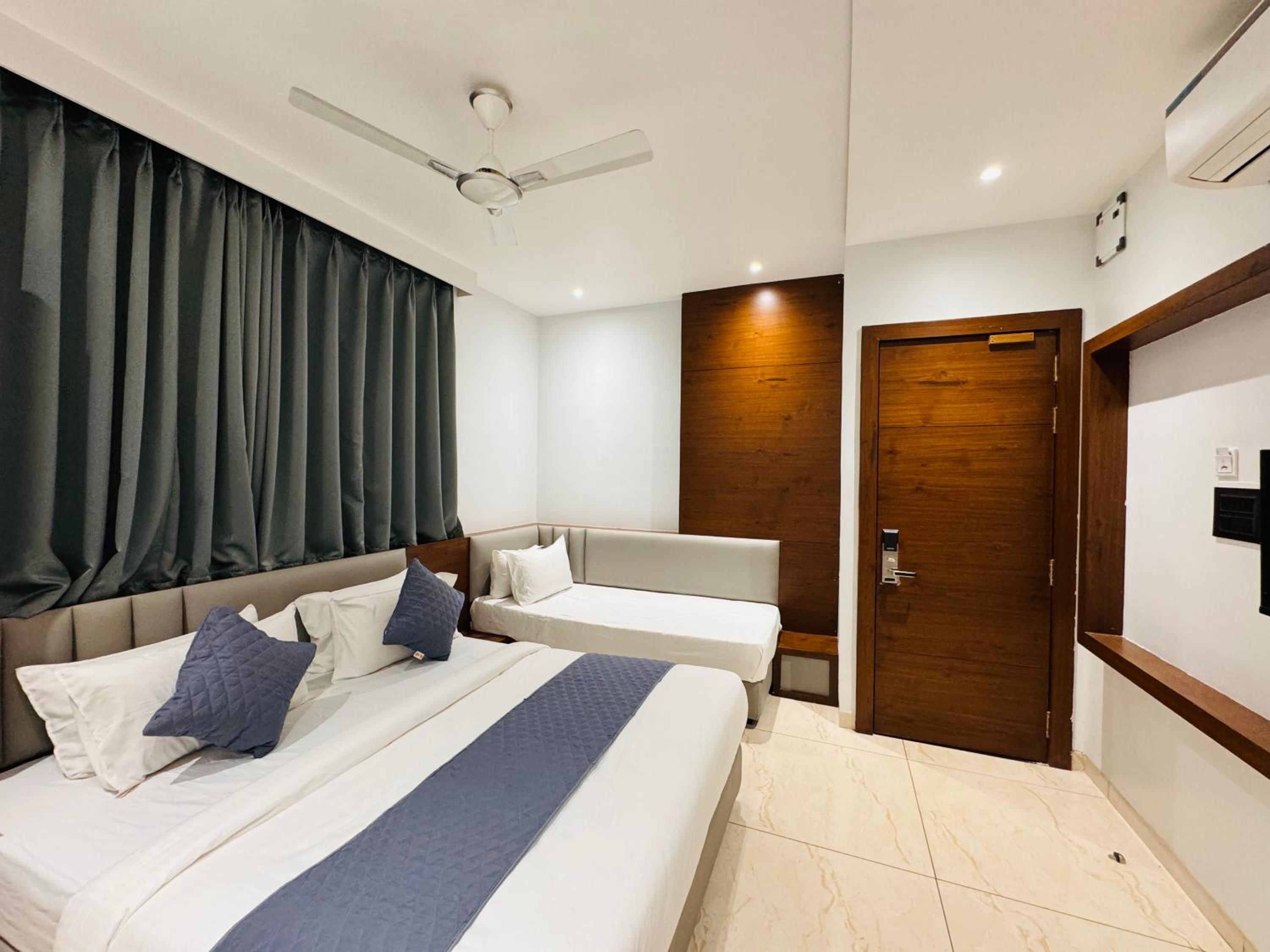 Deluxe Triple Room - Photo 6